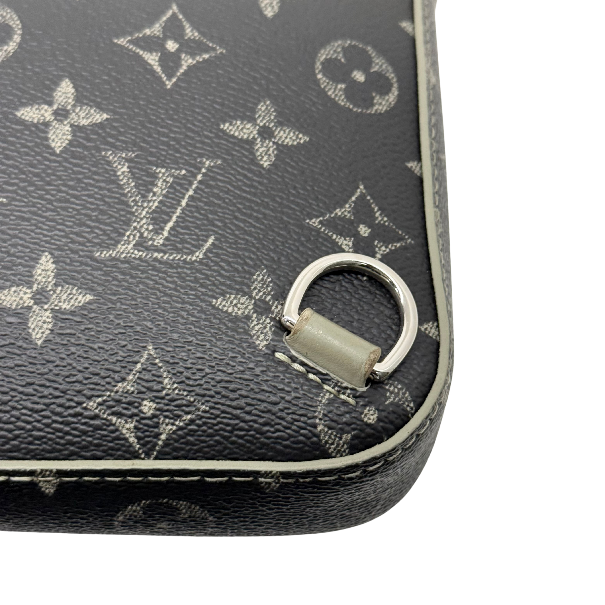 Pre-owned crossbody bag corner detail with beige ring and monogram canvas trim