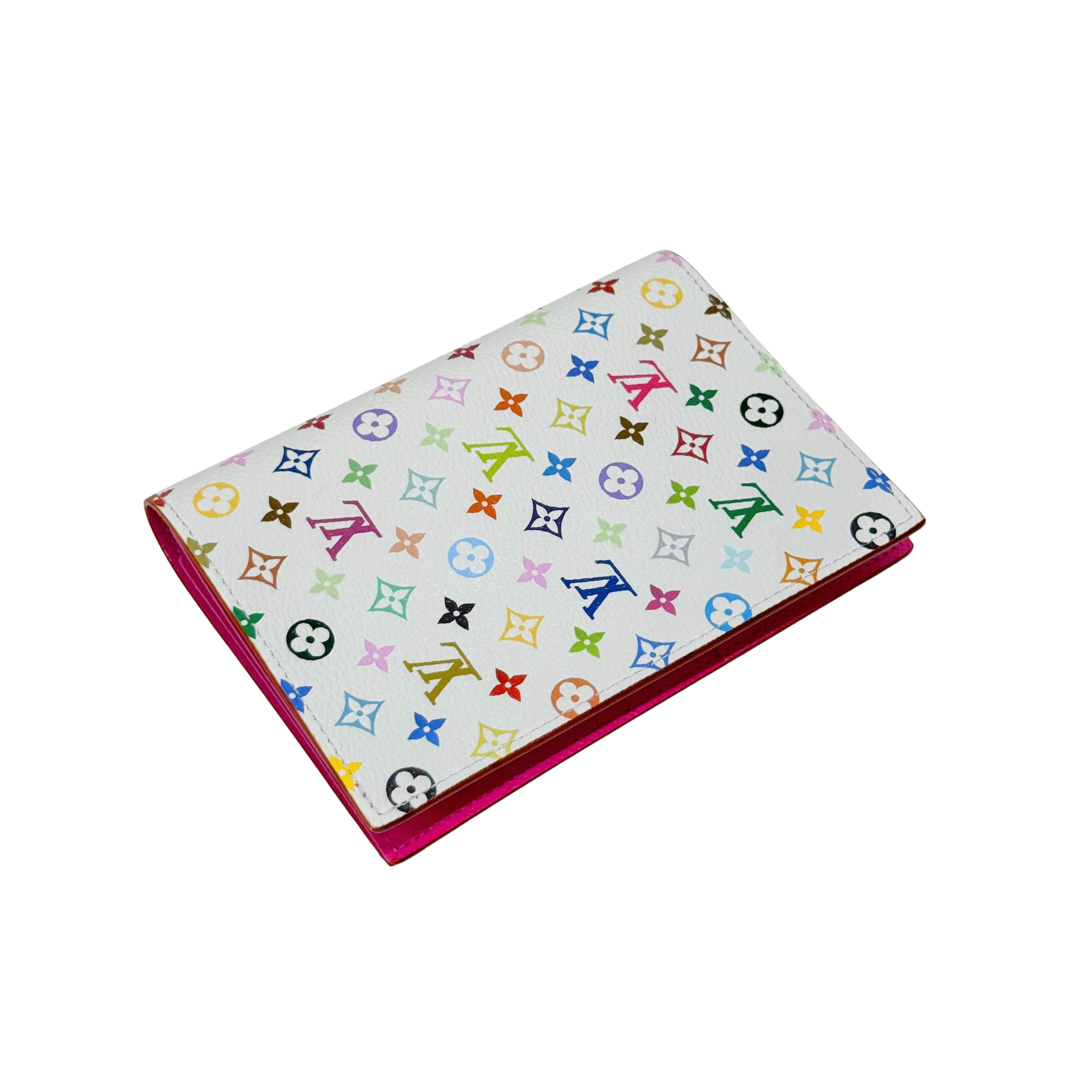 Multicolor Louis Vuitton monogram card holder with white exterior and magenta trim