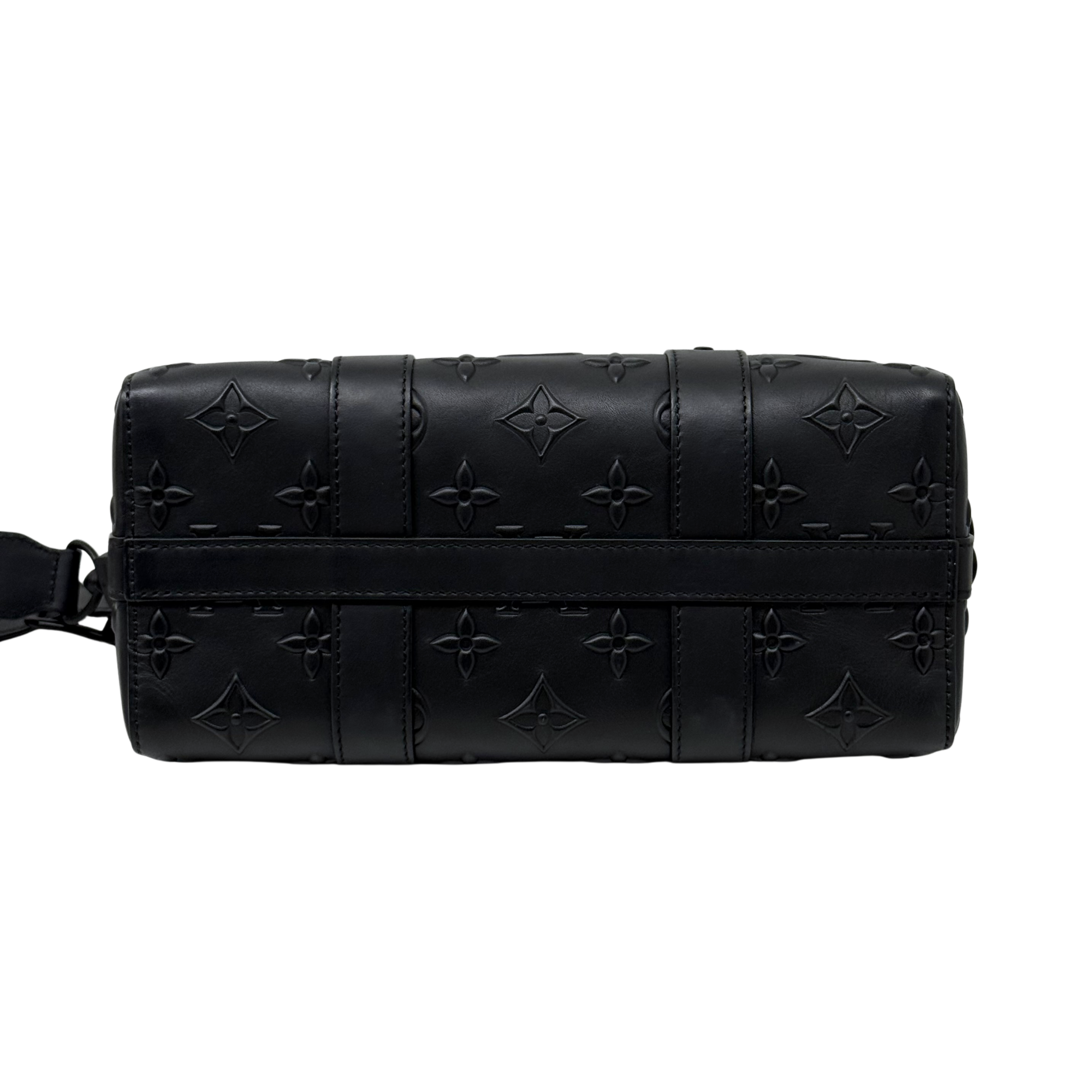 Black Louis Vuitton monogram crossbody bag with embossed panels and shoulder strap