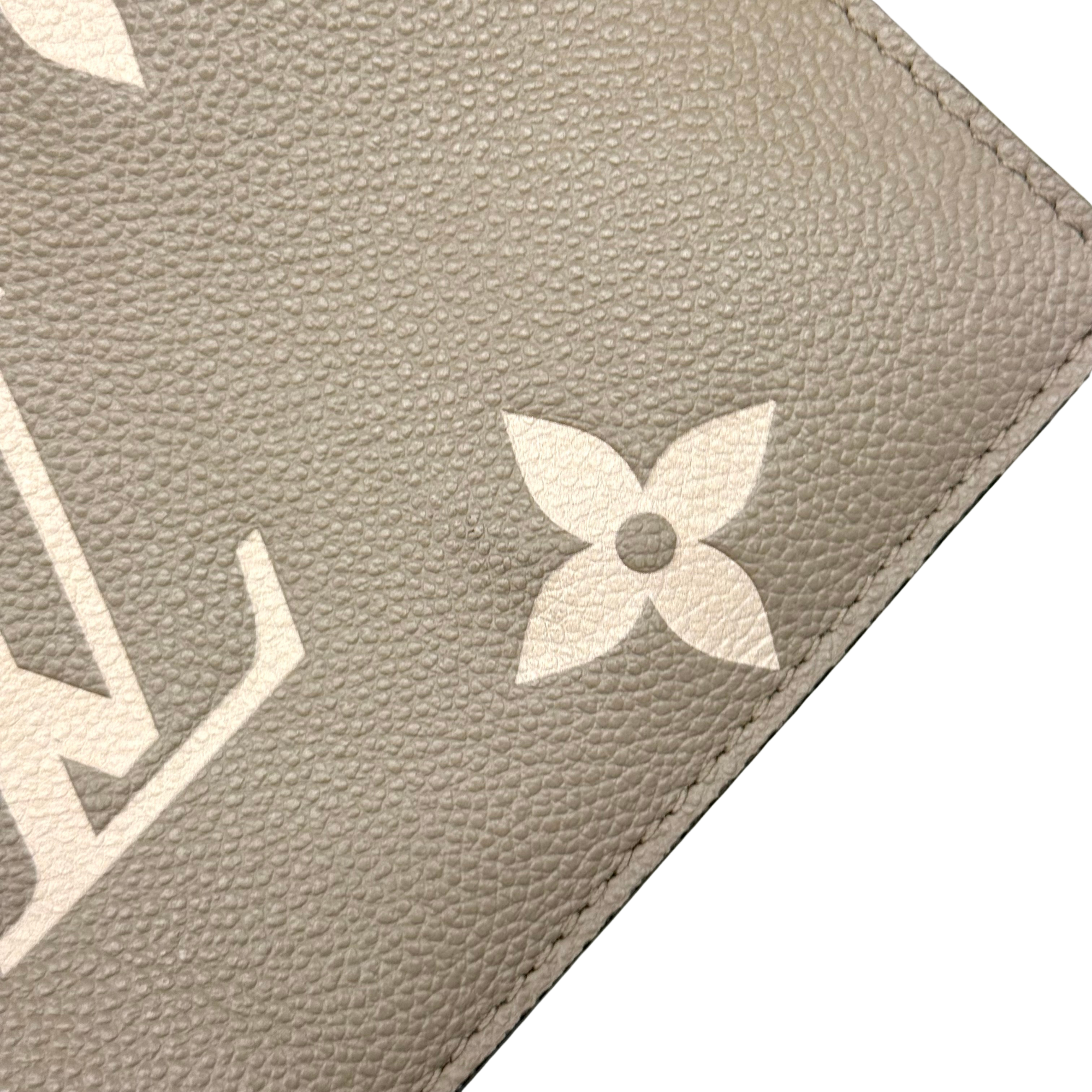 Louis Vuitton Monogram Giant Bicolor Empreinte Neonoe MM bucket bag (pre-owned)