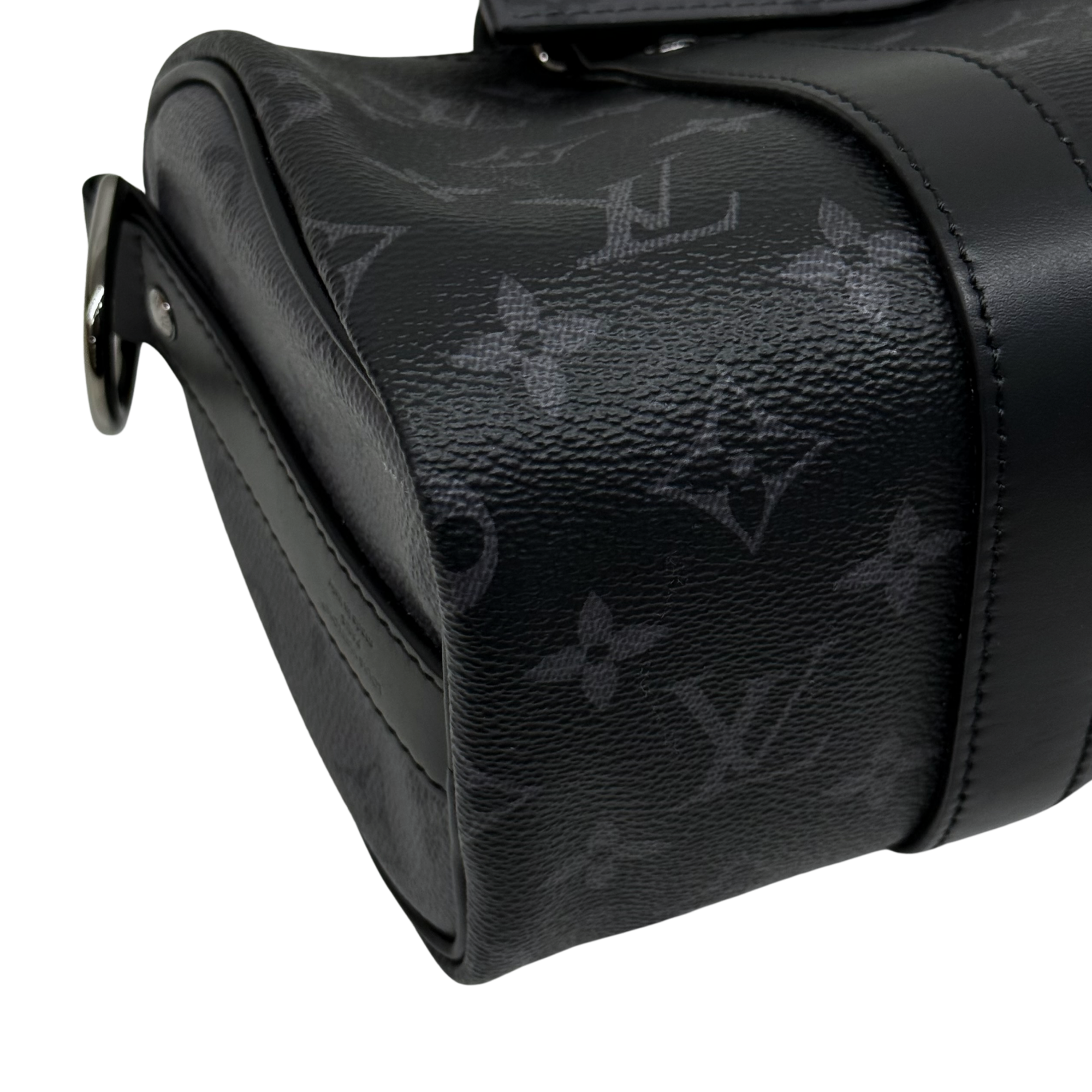 Black monogram bag end panel with textured leather trim