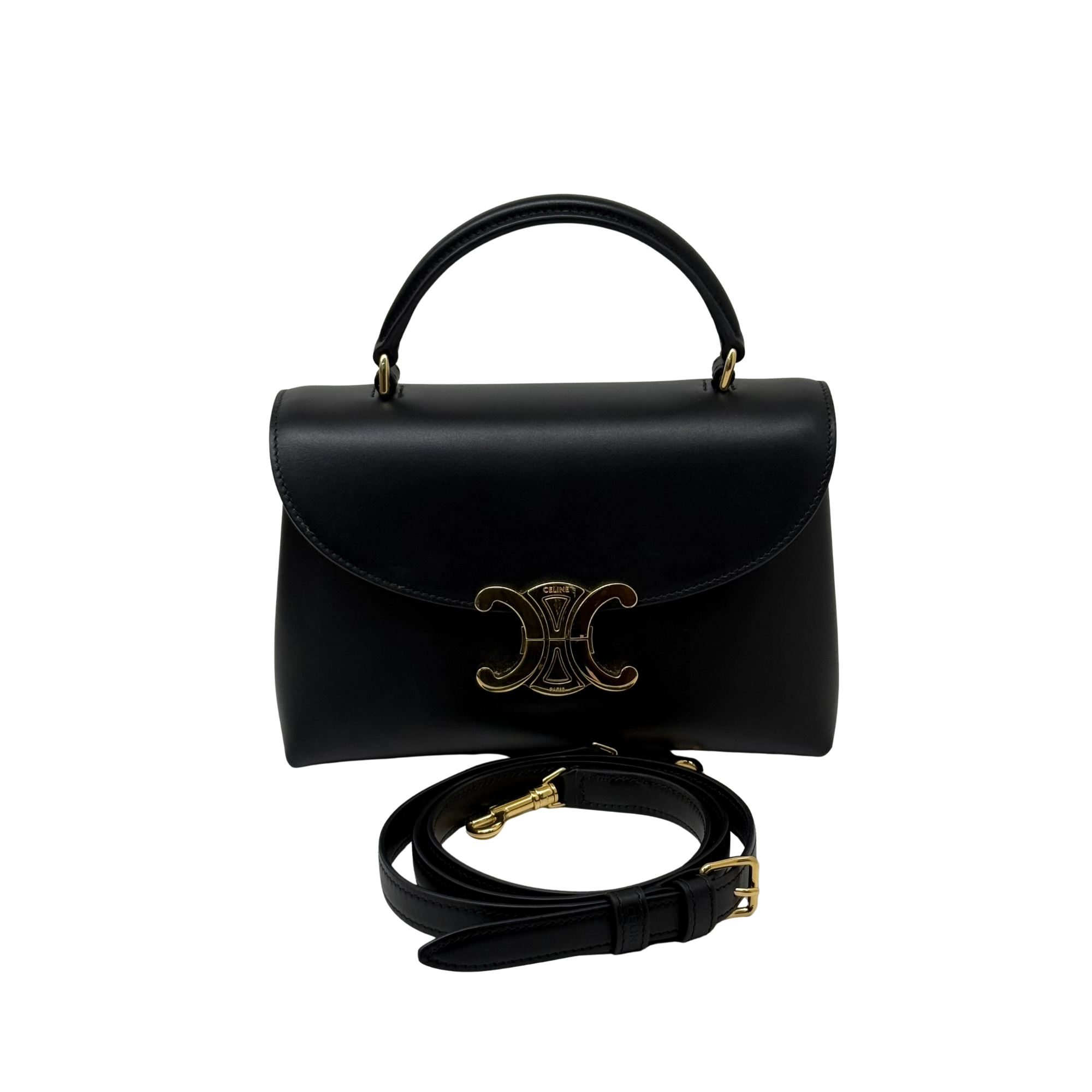 Black leather top-handle bag with gold-tone clasp and matching shoulder strap