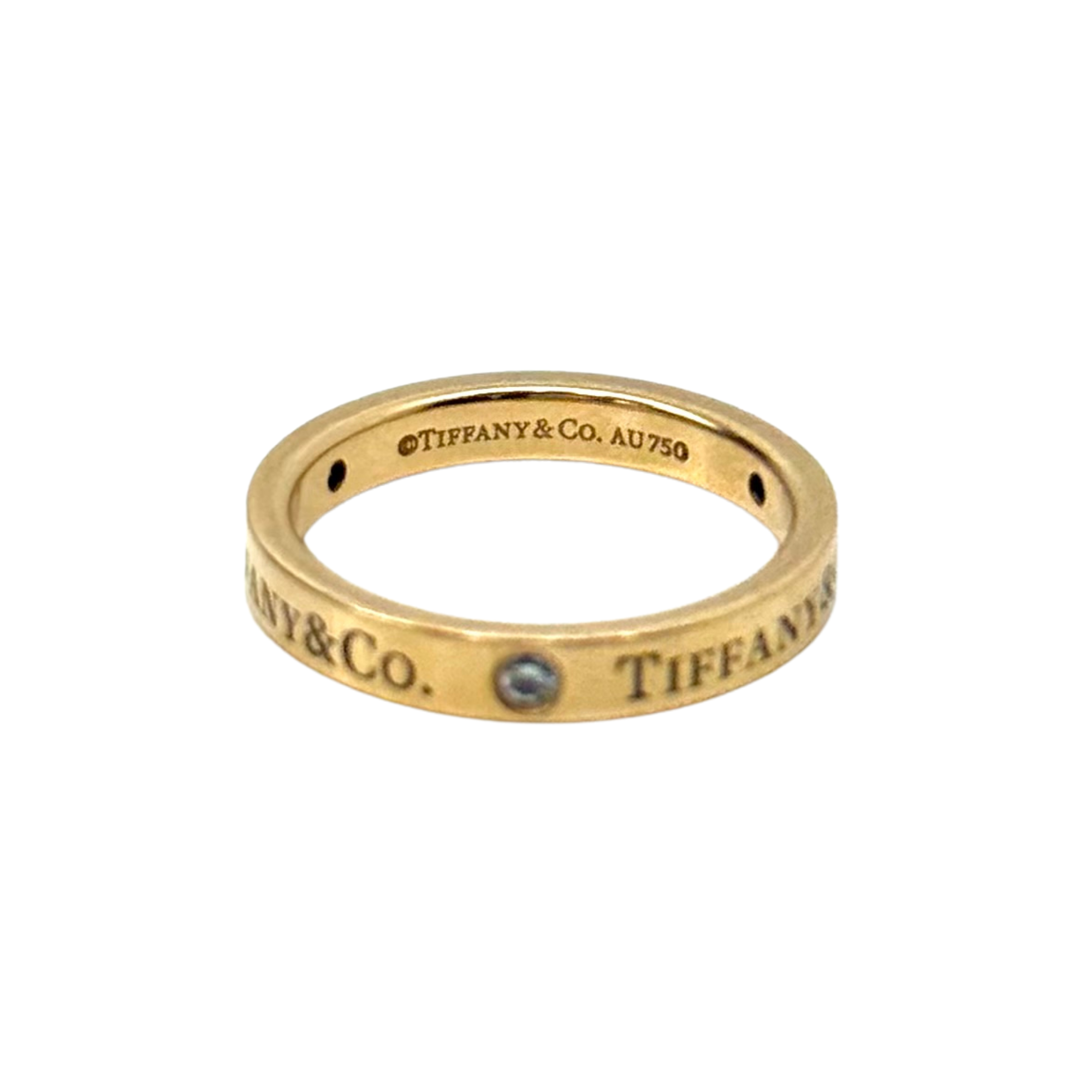 Pre-owned Tiffany & Co. 18k yellow gold band ring with blue gemstone and engraving