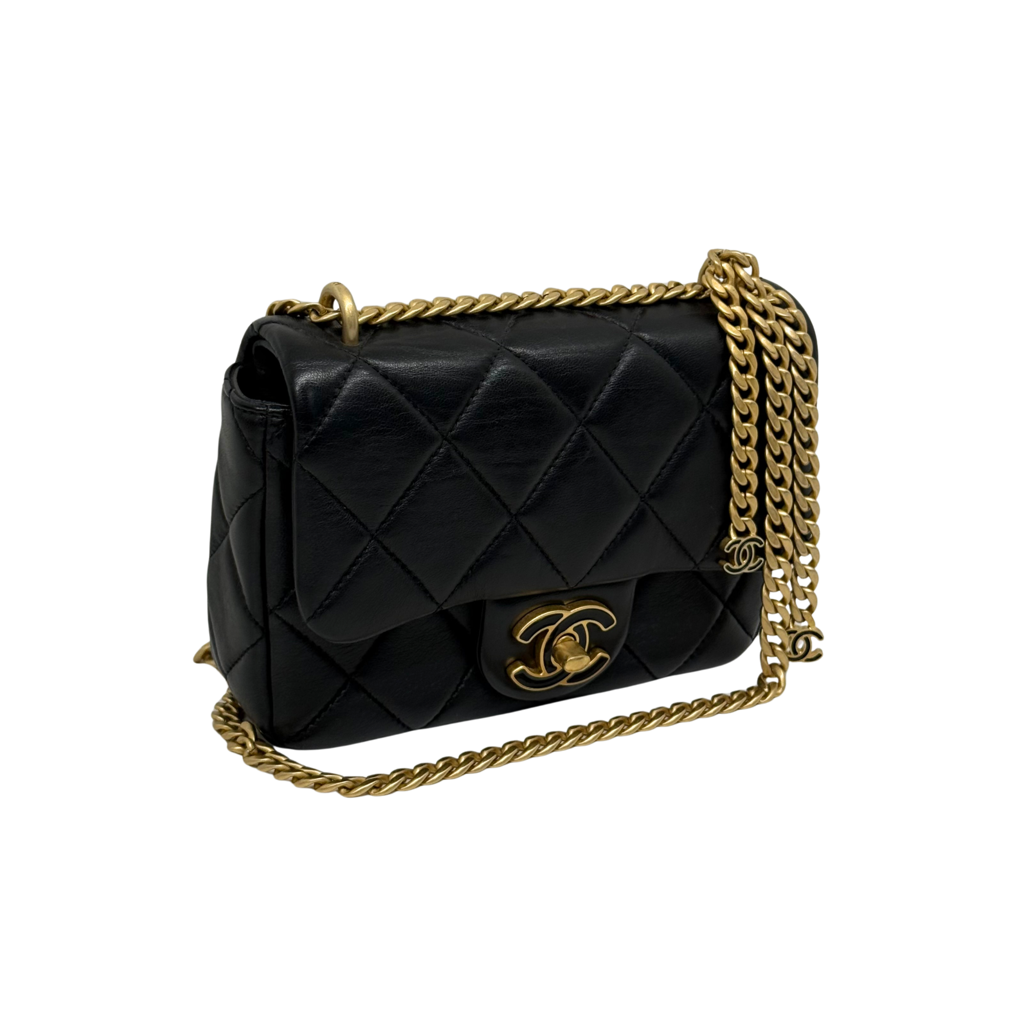 Black quilted flap bag with gold-tone chain and double CC logo front