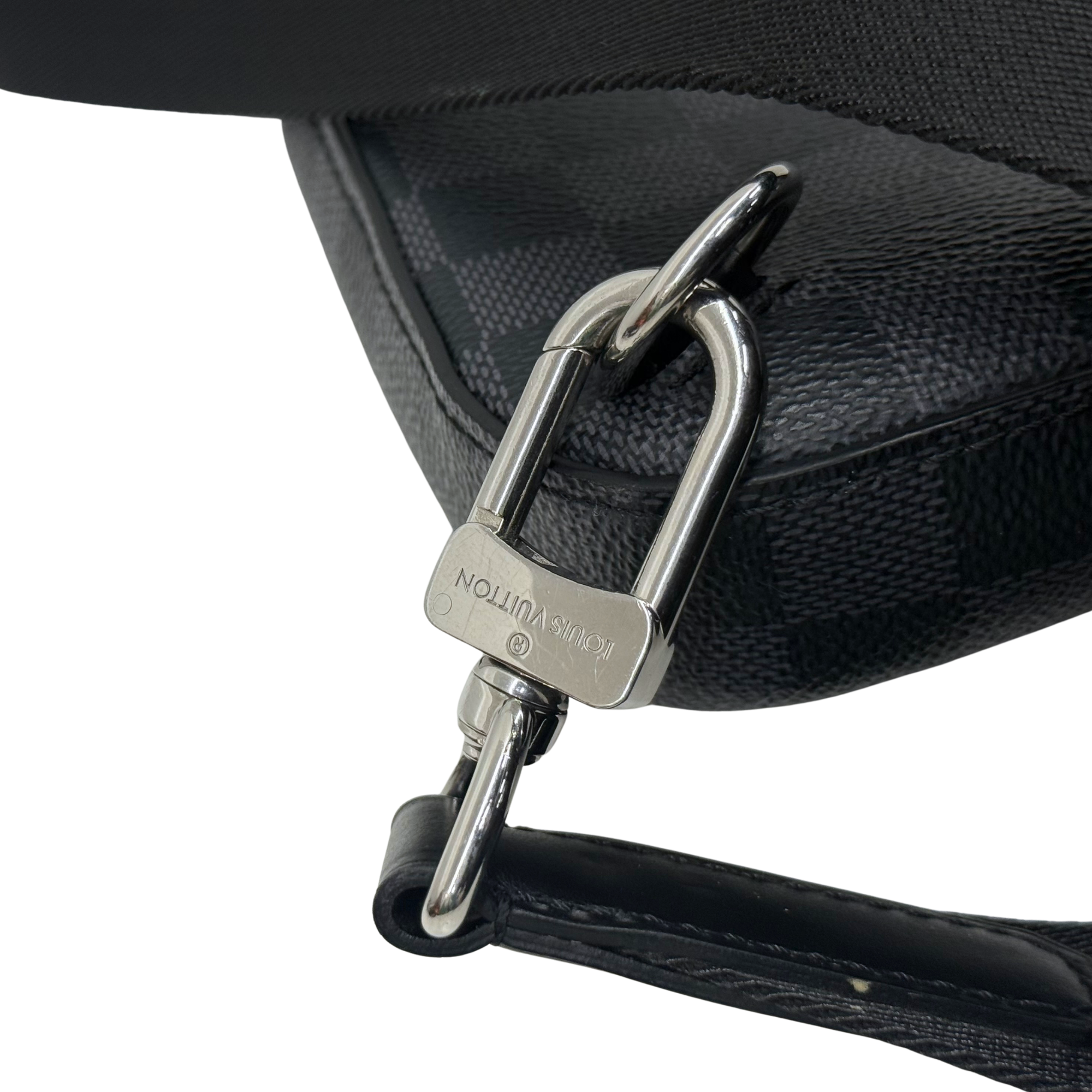 Black leather strap with silver-tone ring and clasp hardware detail