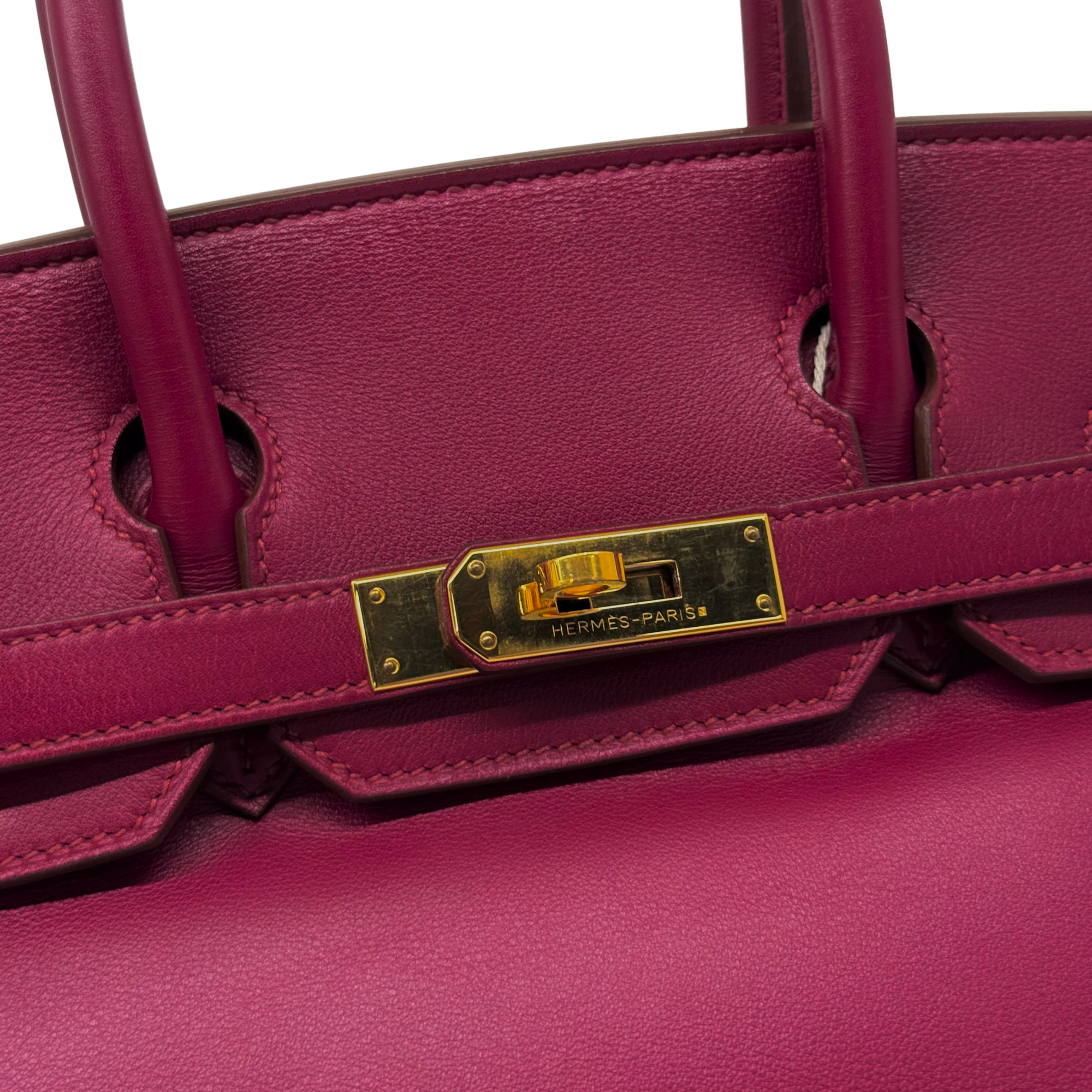 Hermès Birkin 30 magenta leather bag with top handles and gold turn-lock clasp