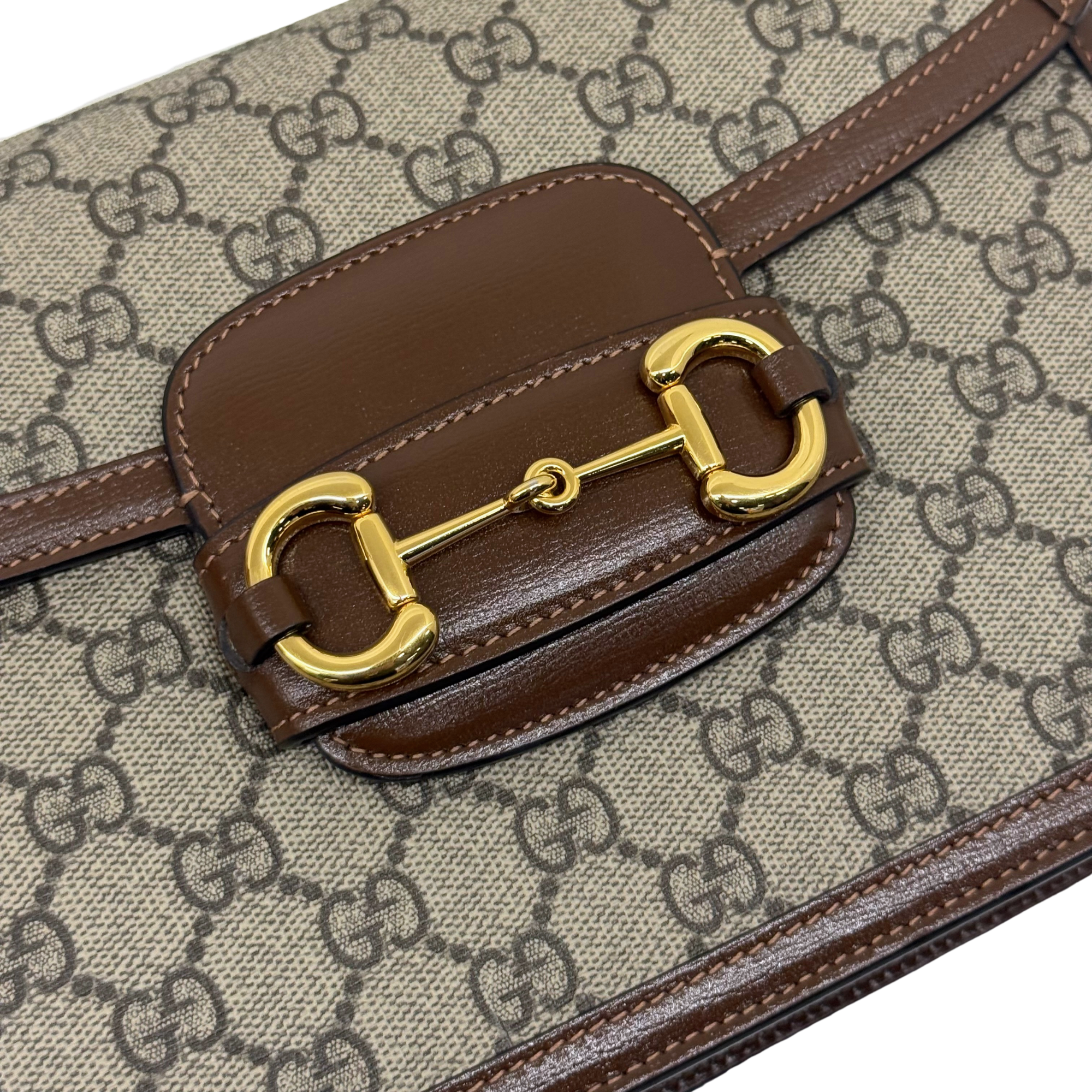 Pre-owned Gucci crossbody bag with monogram canvas, brown trim, gold horsebit clasp