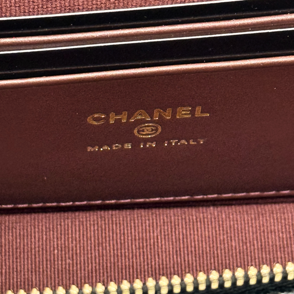 Chanel leather bag with gold "CHANEL" and "MADE IN ITALY" stamp