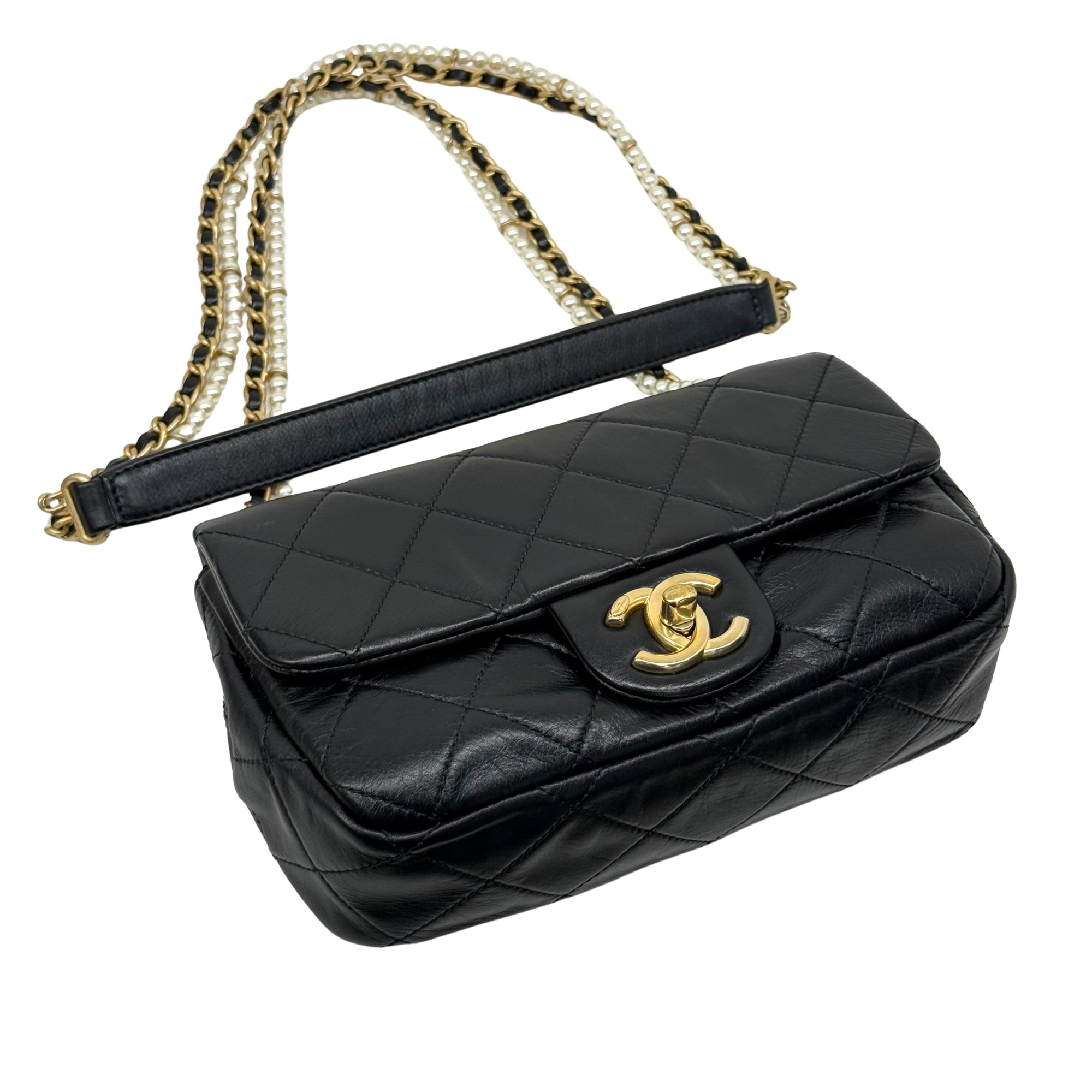 Chanel black bag with pearl strap