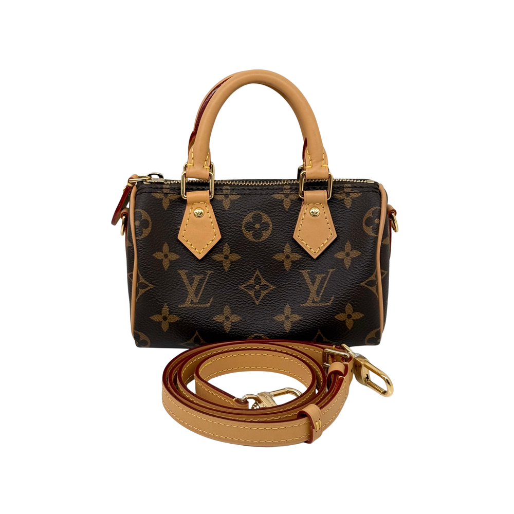 Louis Vuitton monogram canvas mini handbag with top handles and crossbody strap