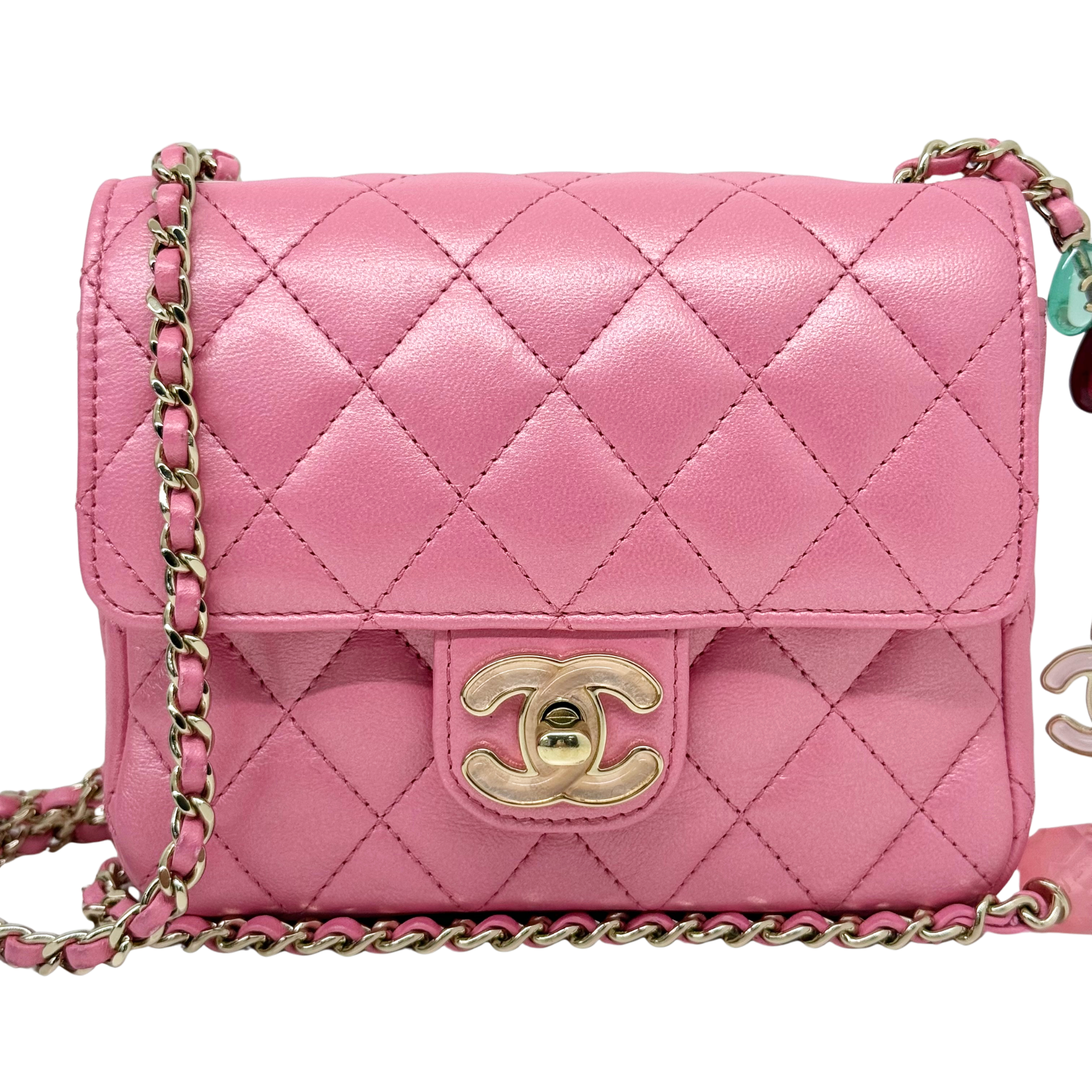 Chanel pink quilted flap bag with gold CC turn-lock and braided chain strap