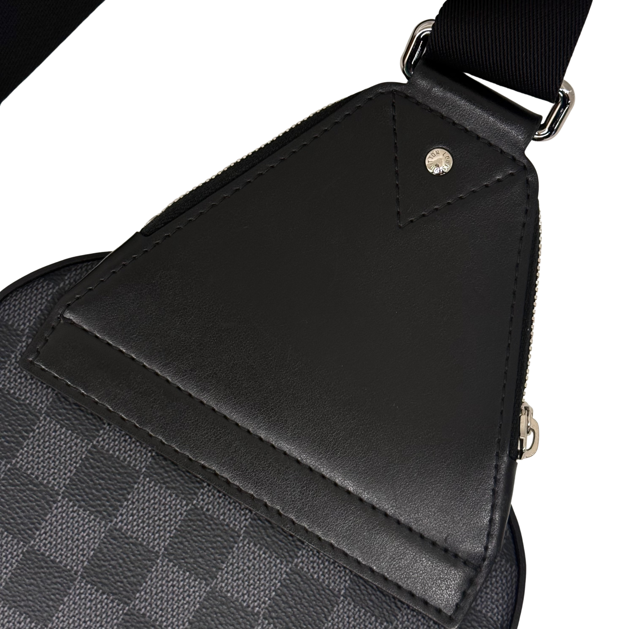 Black leather flap corner with snap button and contrast stitching