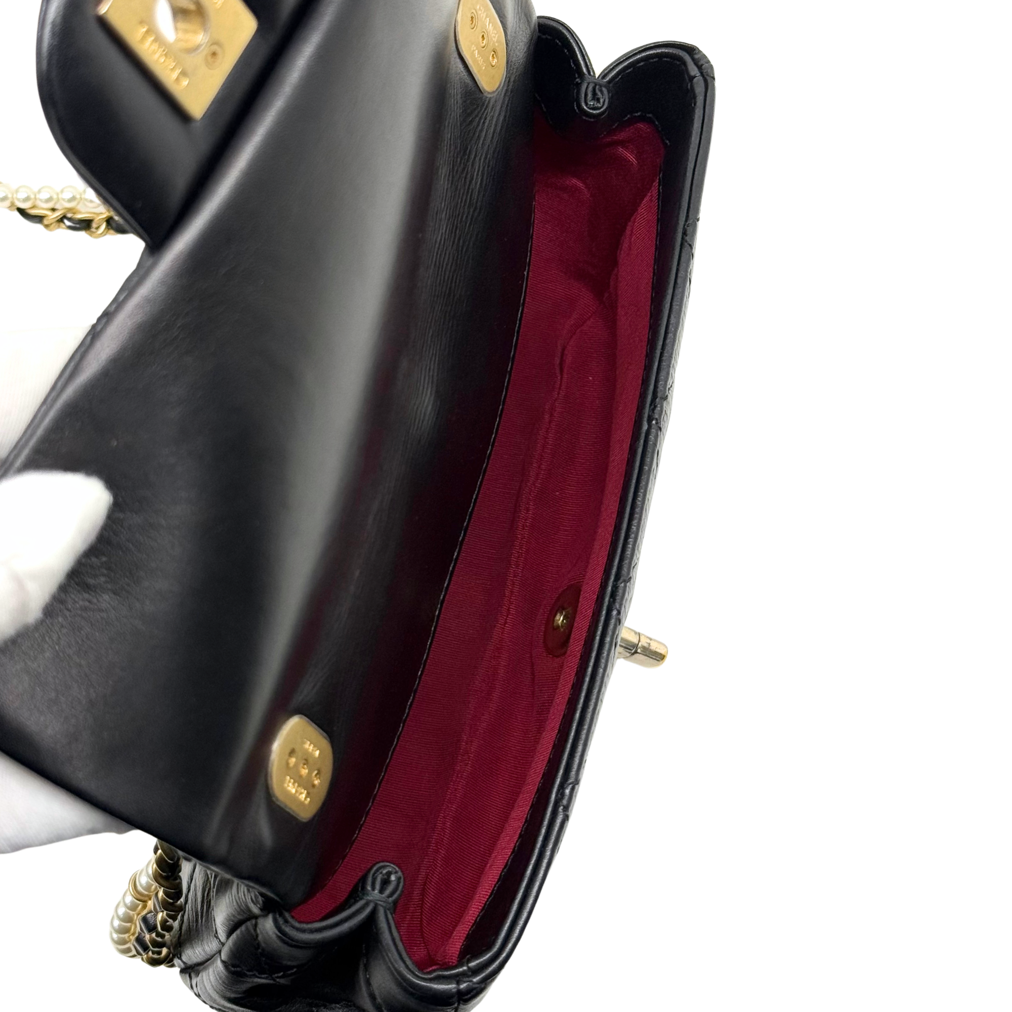 Chanel black bag with pearl strap