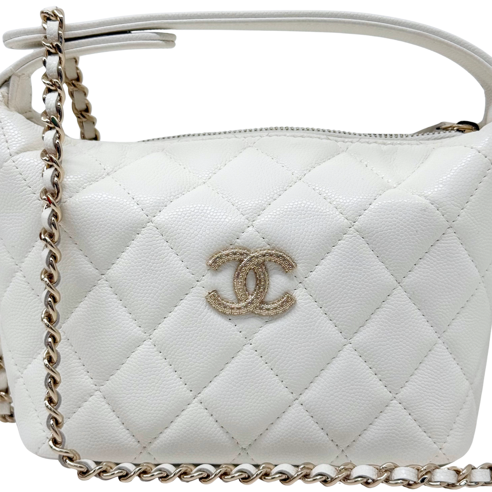 Chanel quilted white shoulder bag with gold-tone CC logo and chain strap