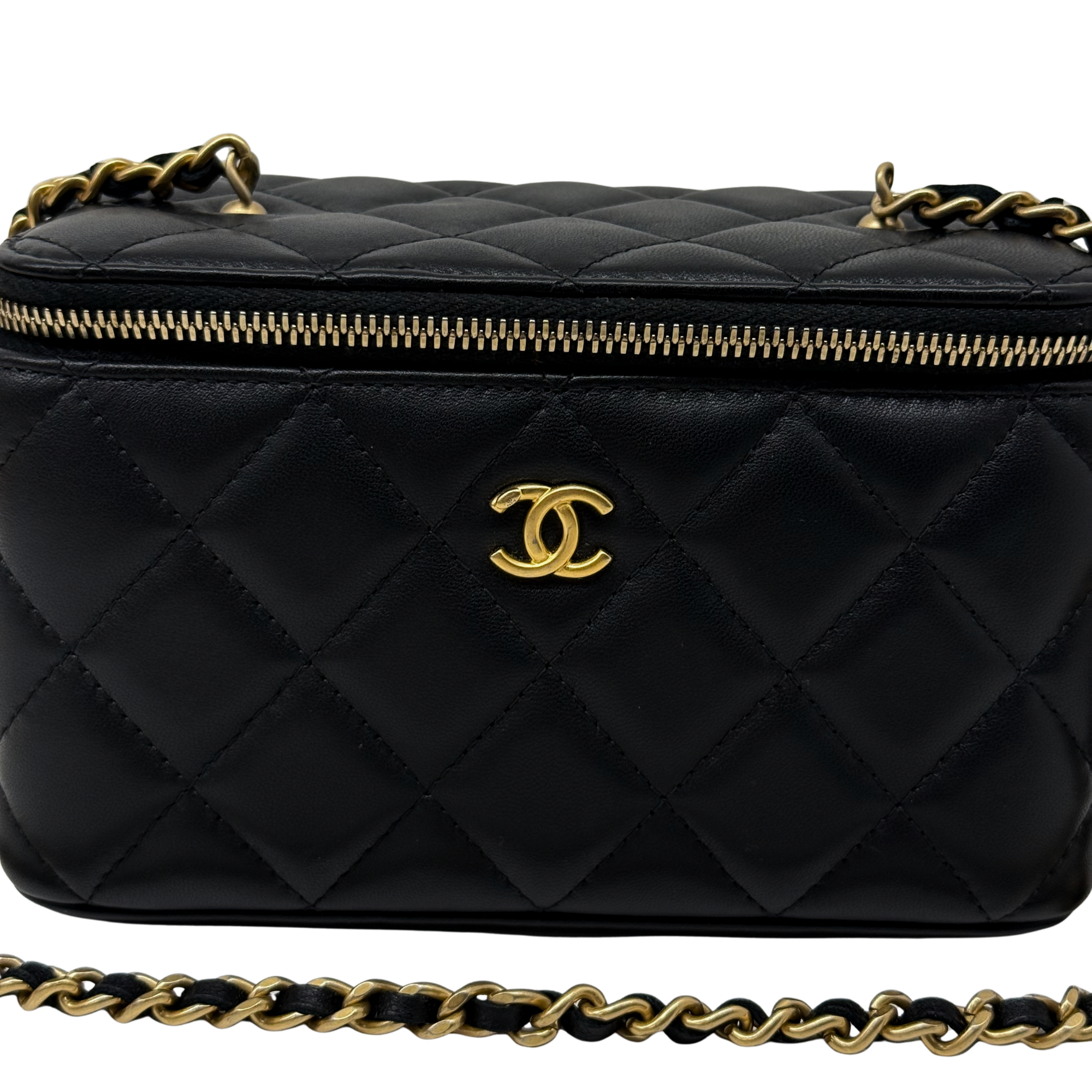 Black quilted leather bag with gold CC emblem and long gold zip closure