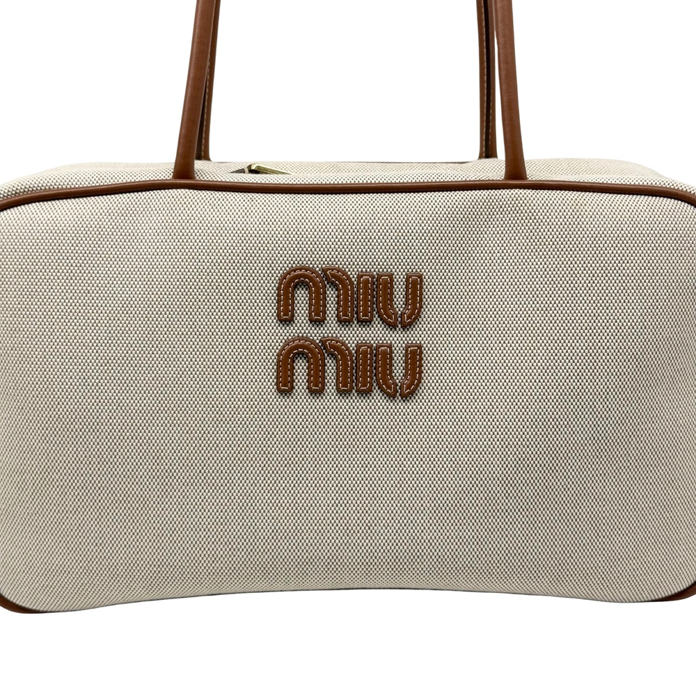Miu Miu canvas duffel bag front with double Miu Miu logo