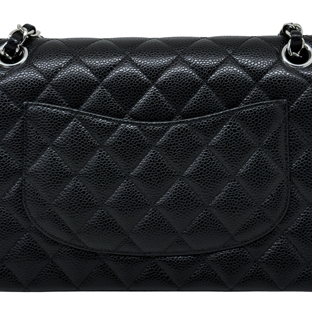 Quilted Chanel shoulder bag in dark textured leather with diamond pattern and curved flap