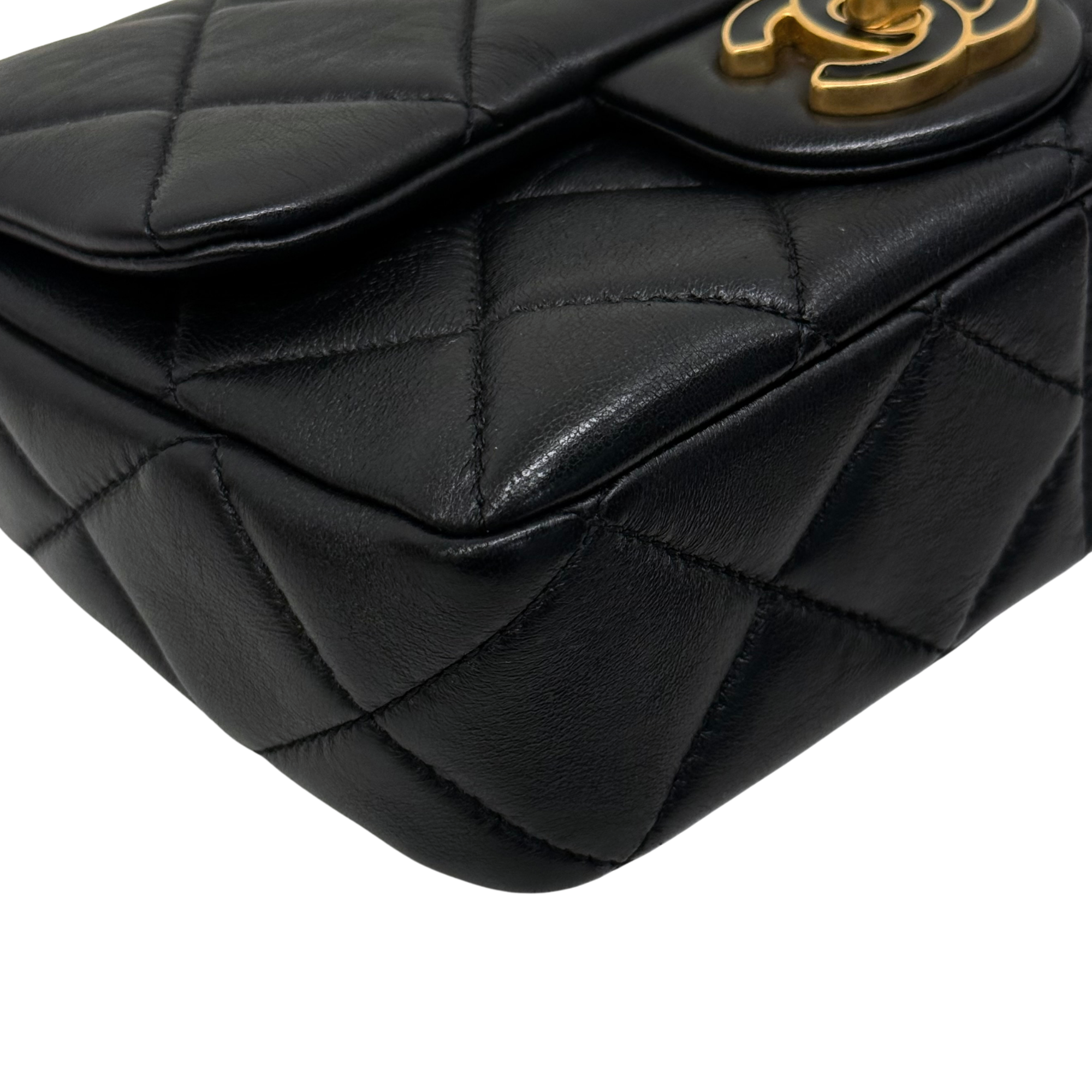 Black quilted leather shoulder bag with gold-tone flap turn-lock hardware