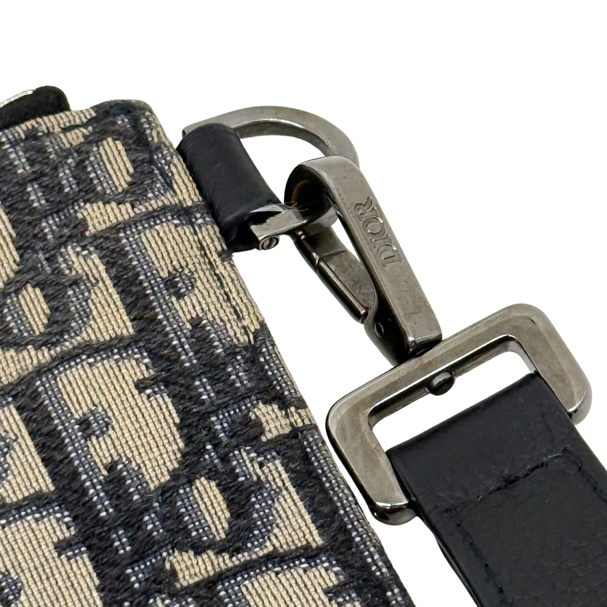 Dior pre-owned wrist strap and metal rings with zipper on patterned canvas pouch