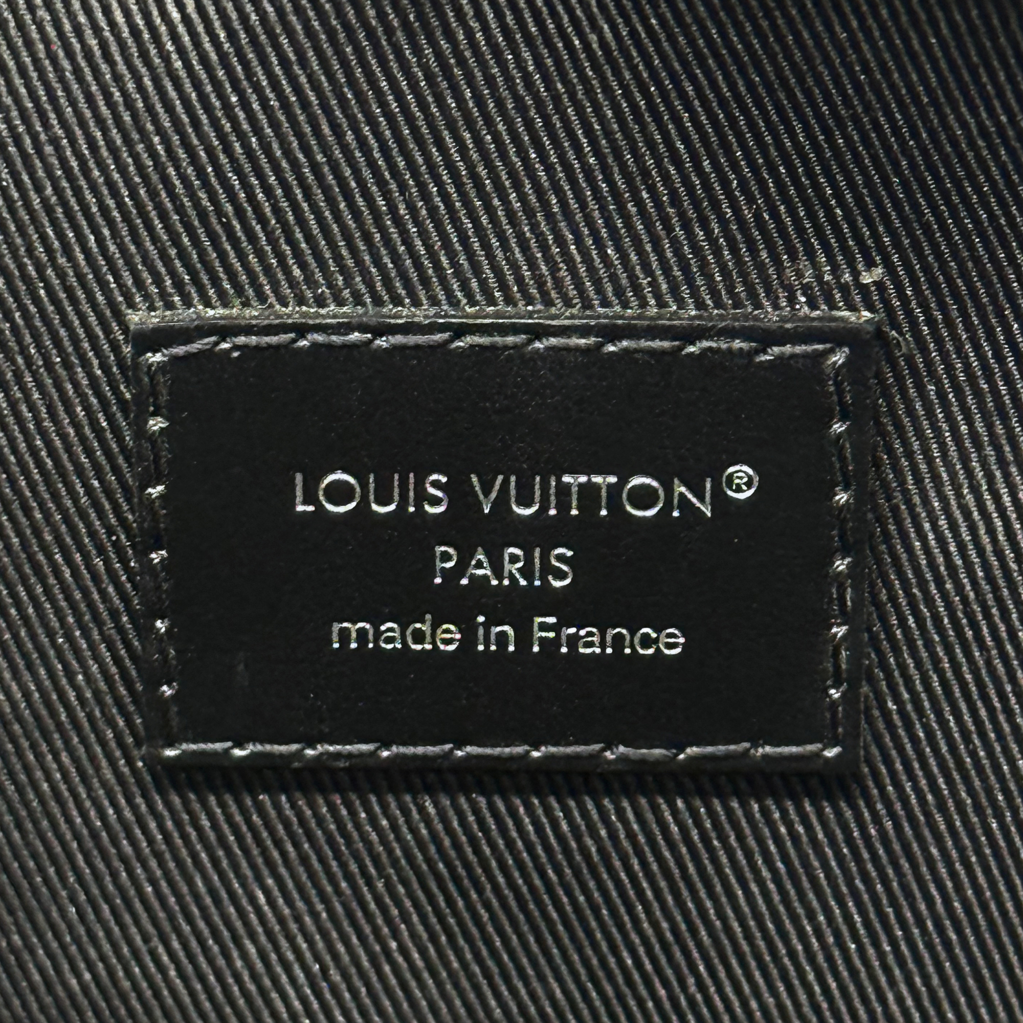 Louis Vuitton Paris made in France logo label on black lining
