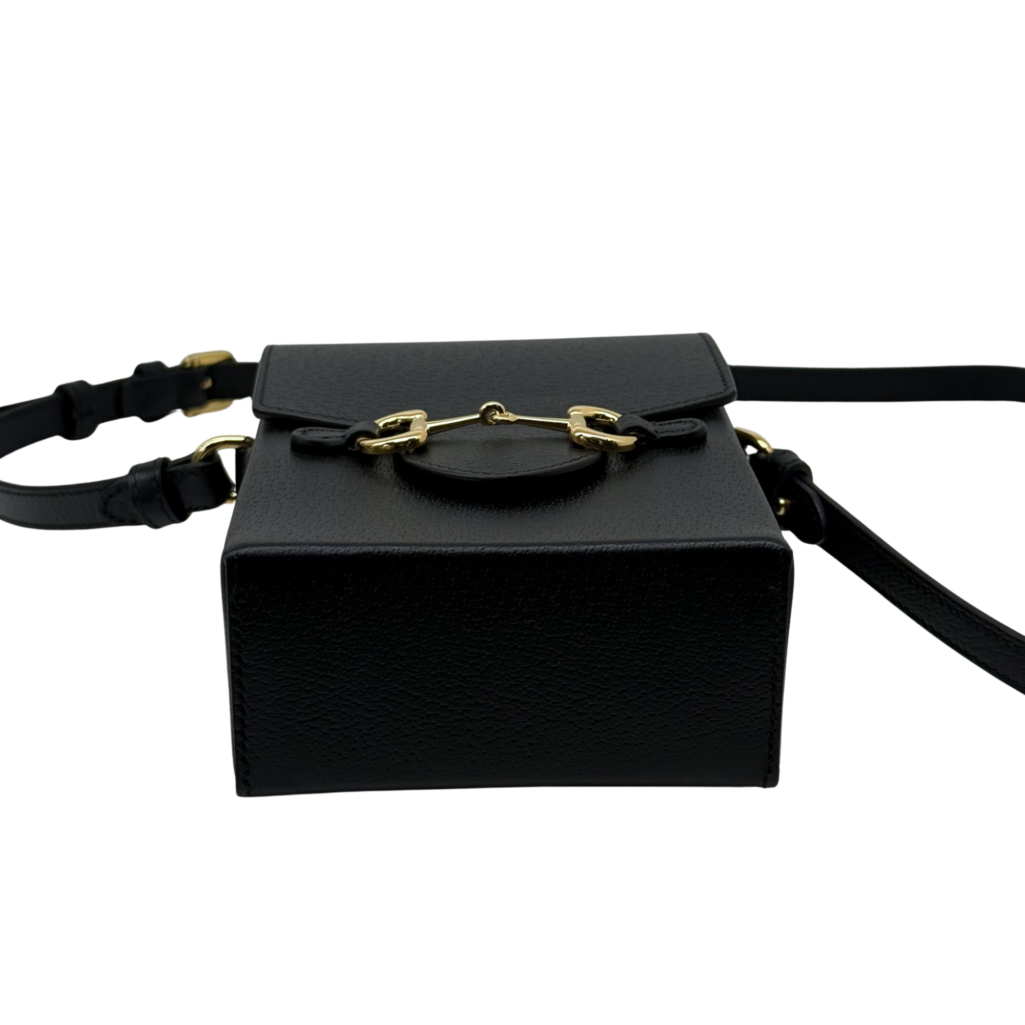 Gucci black leather mini crossbody bag with top flap and gold clasp, front view