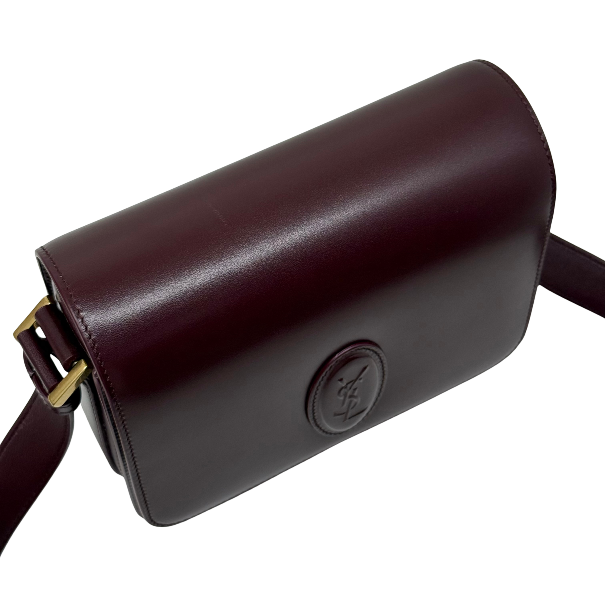 Saint Laurent Le 61 Besace bag back view with embossed YSL logo on burgundy leather