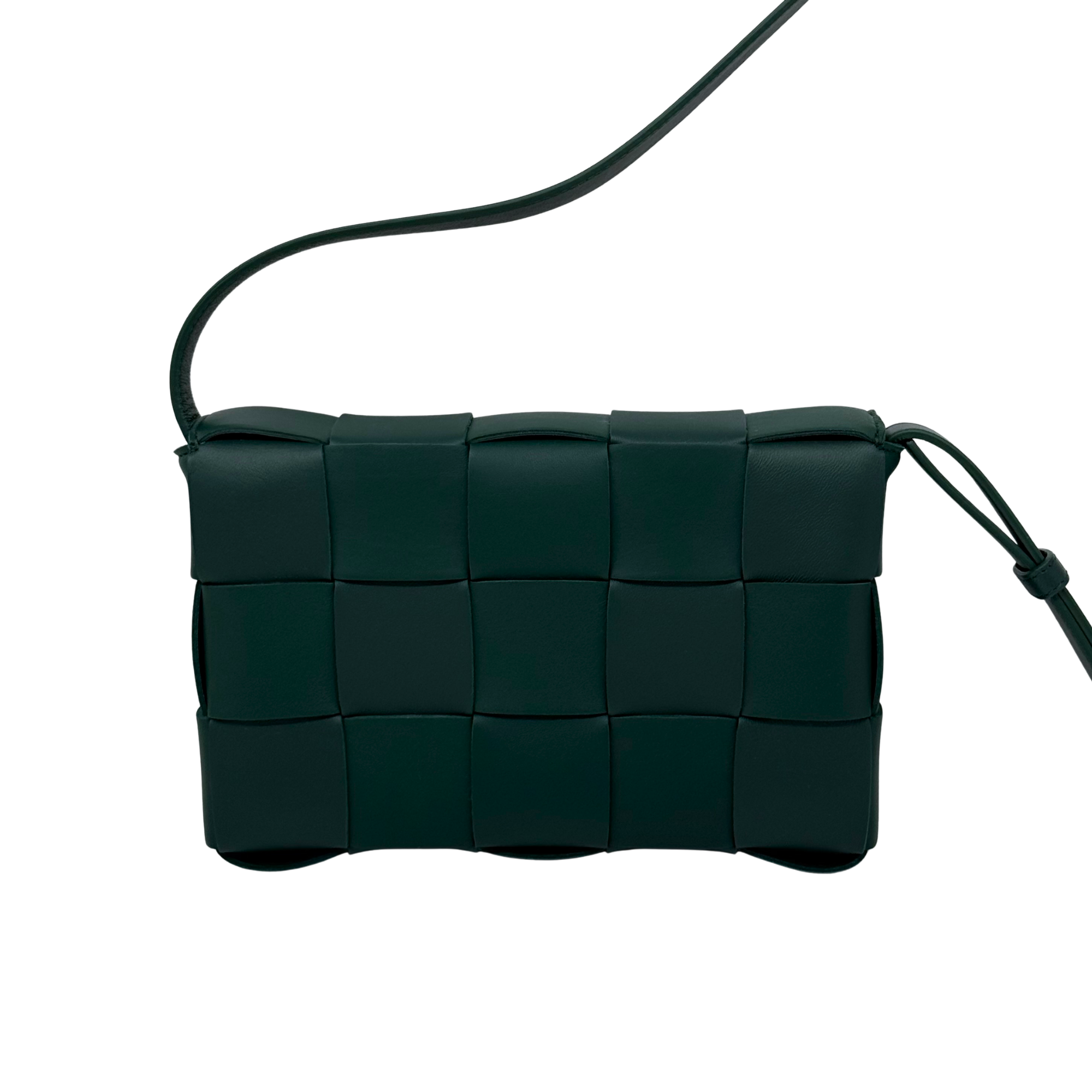 Green woven leather crossbody bag with top handle and strap loop