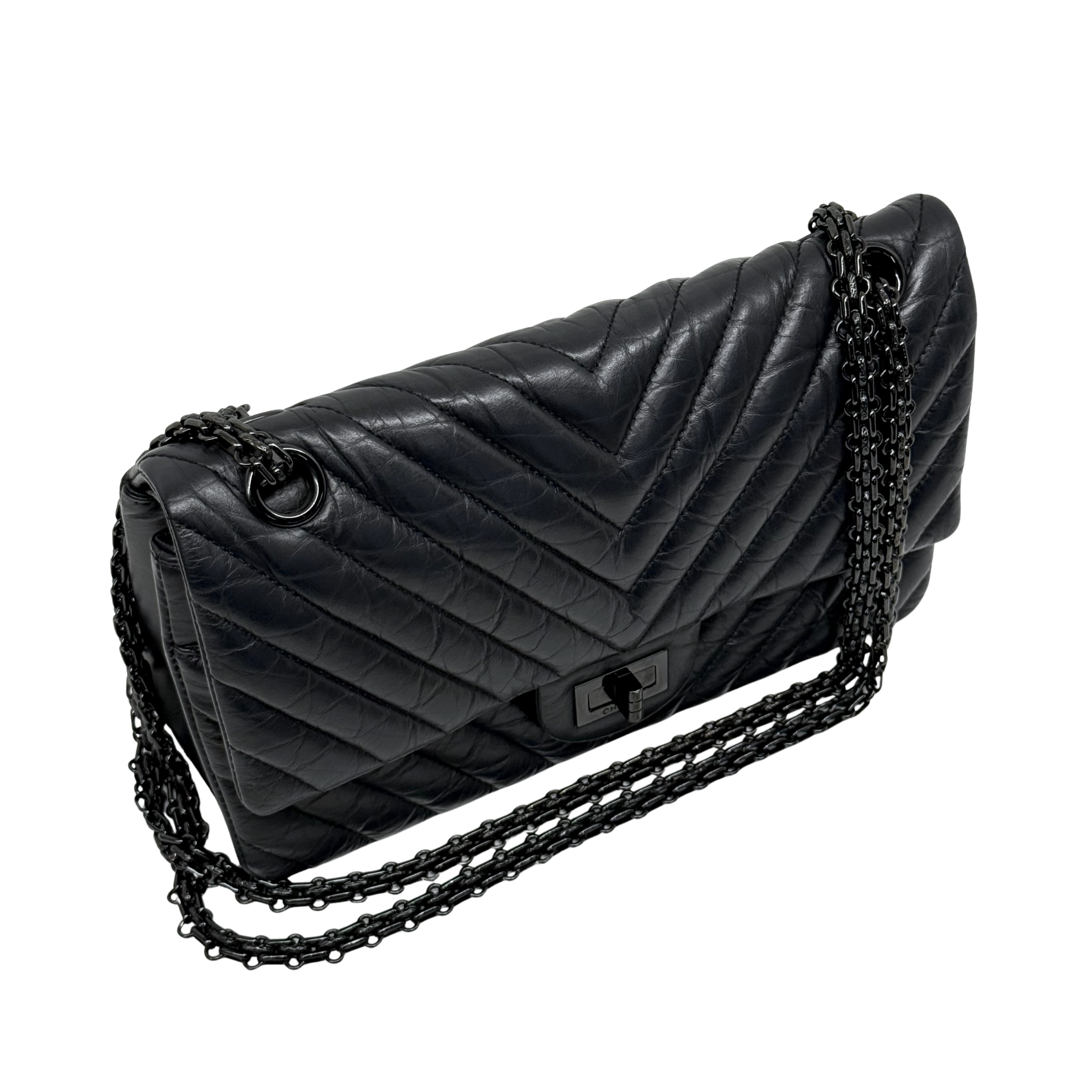 Chanel black bag black hardware triangle