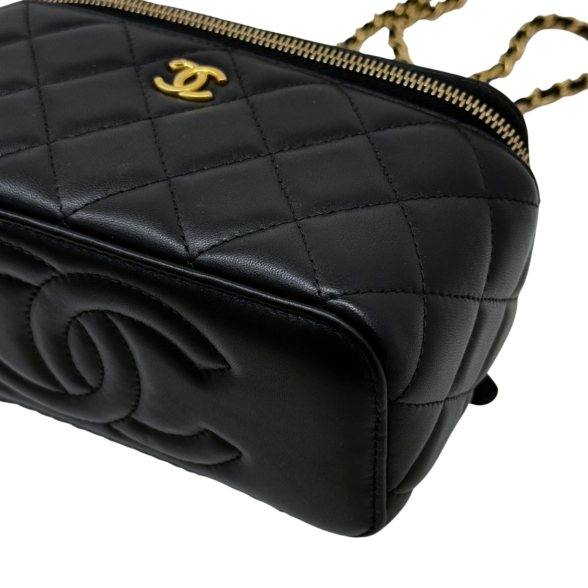 Black quilted leather zip pouch with embossed CC turn-lock and structured edge