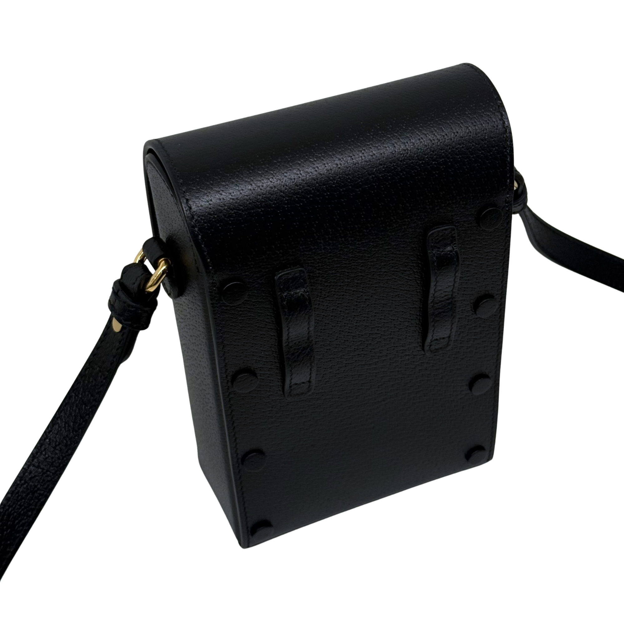 Gucci black leather mini crossbody bag angled view with embossed logo front