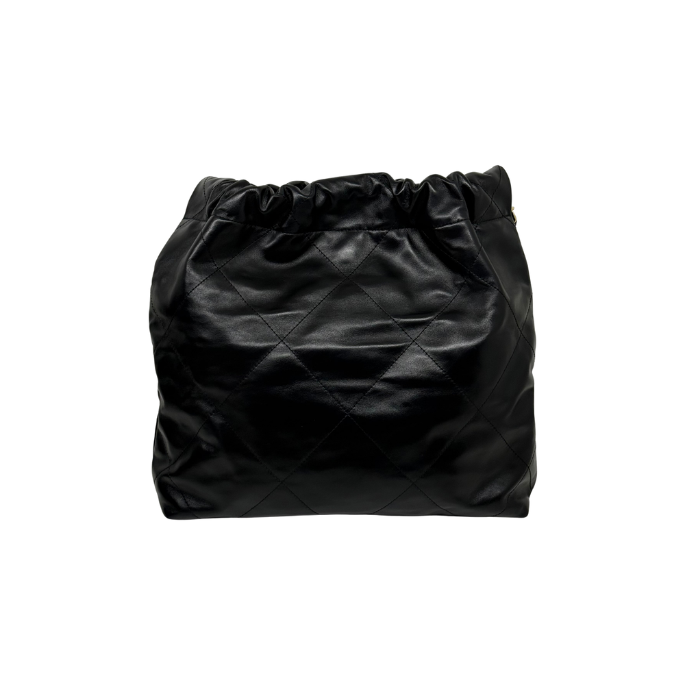 Black quilted Chanel drawstring bag with ruched top and diamond stitching pattern