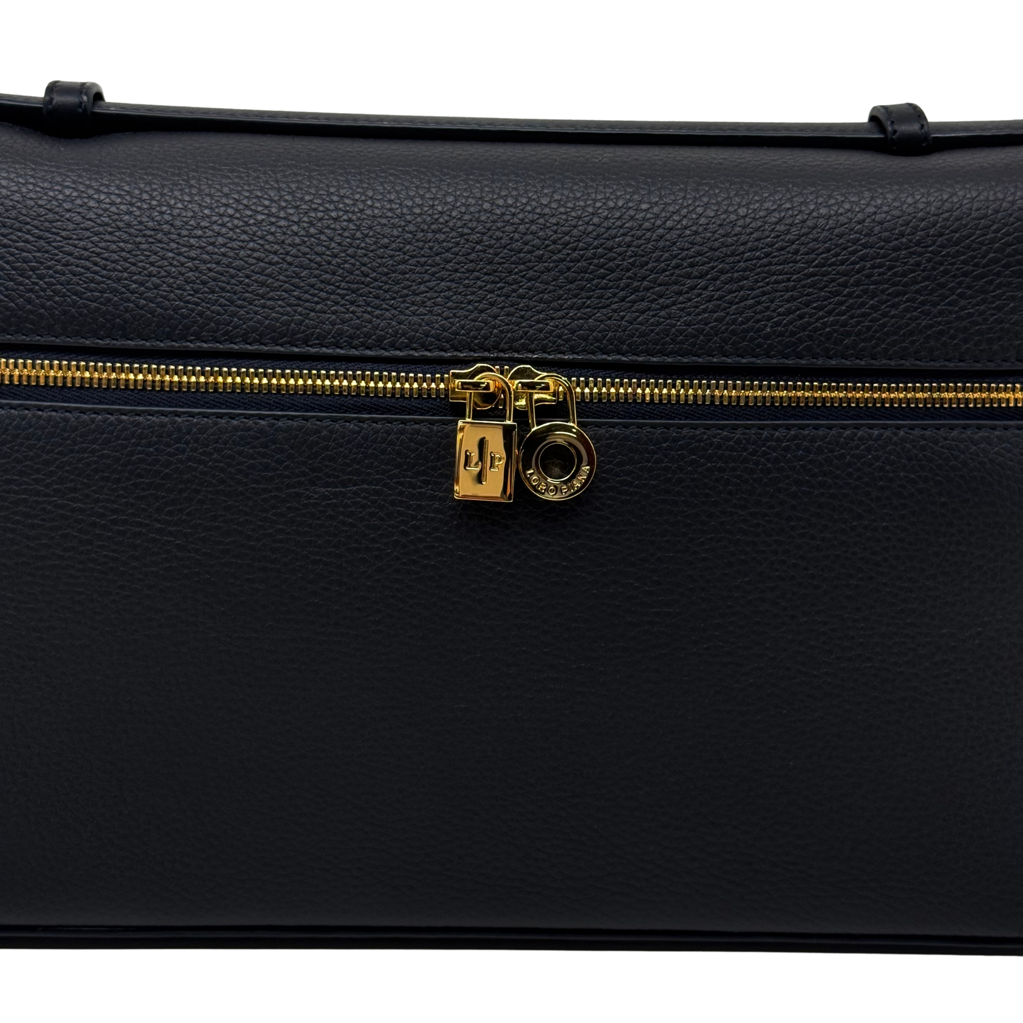 Loro Piana leather zip pouch close-up with gold lock