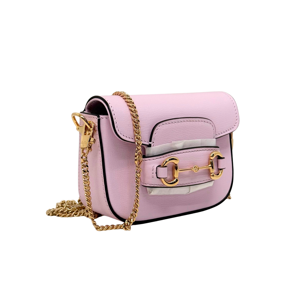 Pink Gucci mini crossbody bag, structured body with front buckle and chain strap