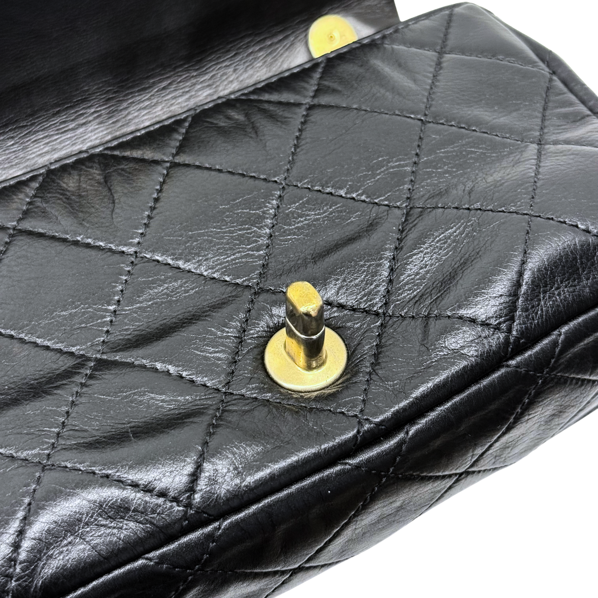 Chanel black bag with pearl strap