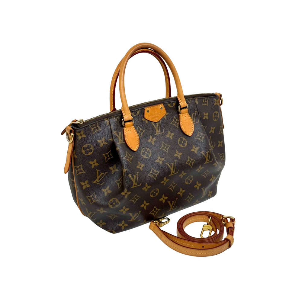 Louis Vuitton monogram handbag with top handles and detachable crossbody strap
