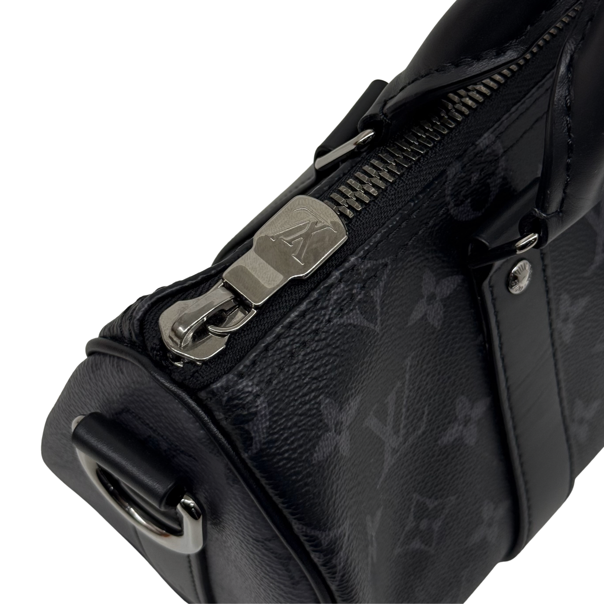 Black monogram bag zipper pull and side latch with metal hardware