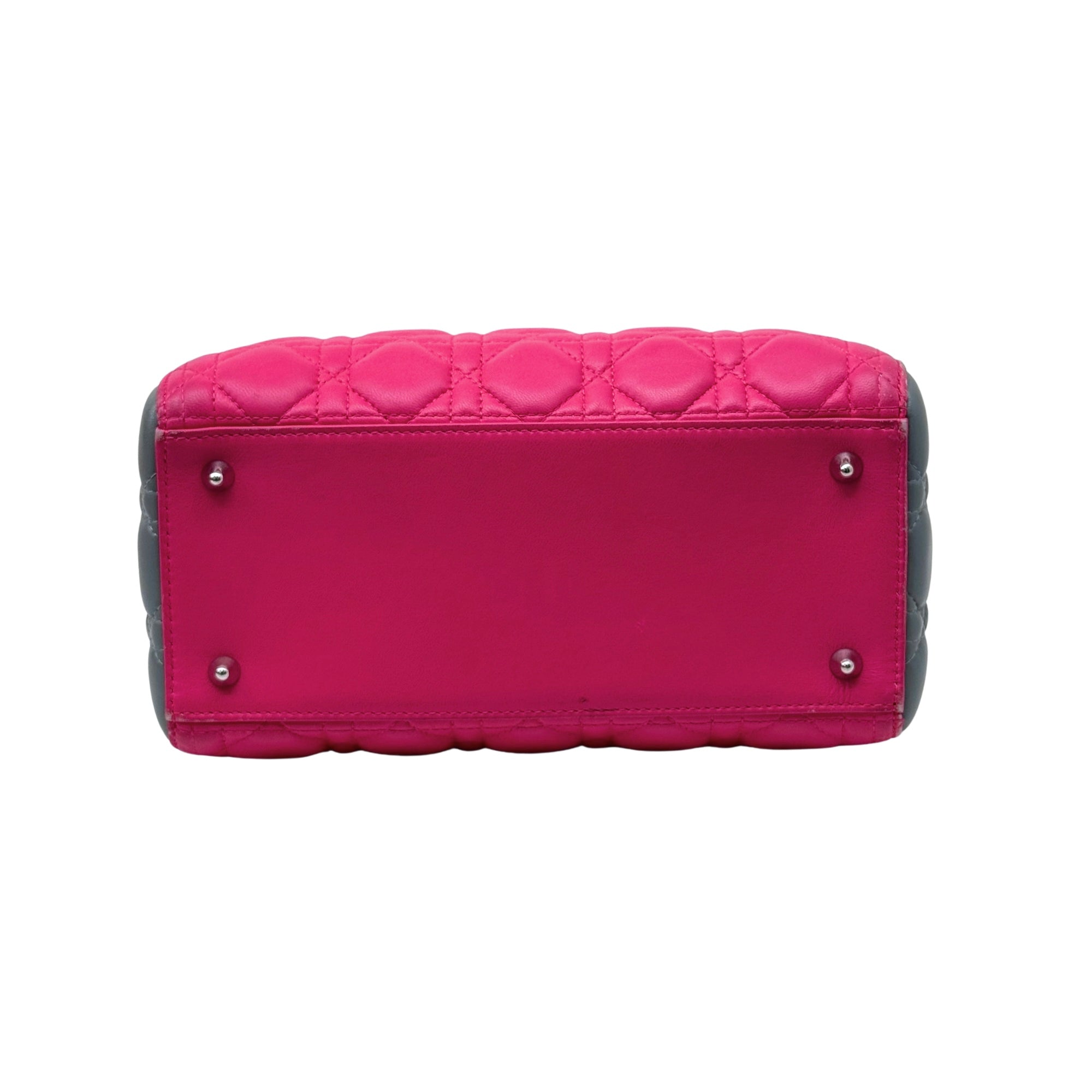 Pre-owned Dior fuchsia quilted handbag with black-trim base and metal corner studs