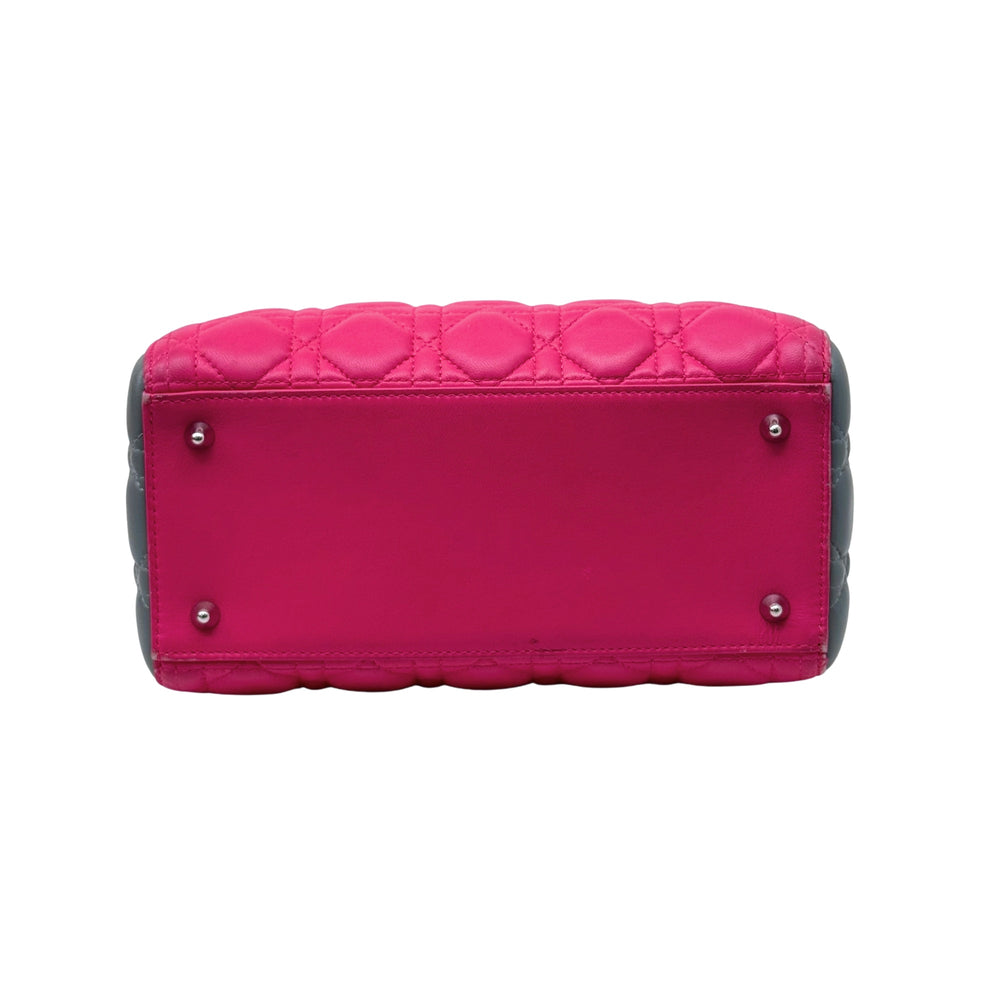 Pre-owned Dior fuchsia quilted handbag with black-trim base and metal corner studs