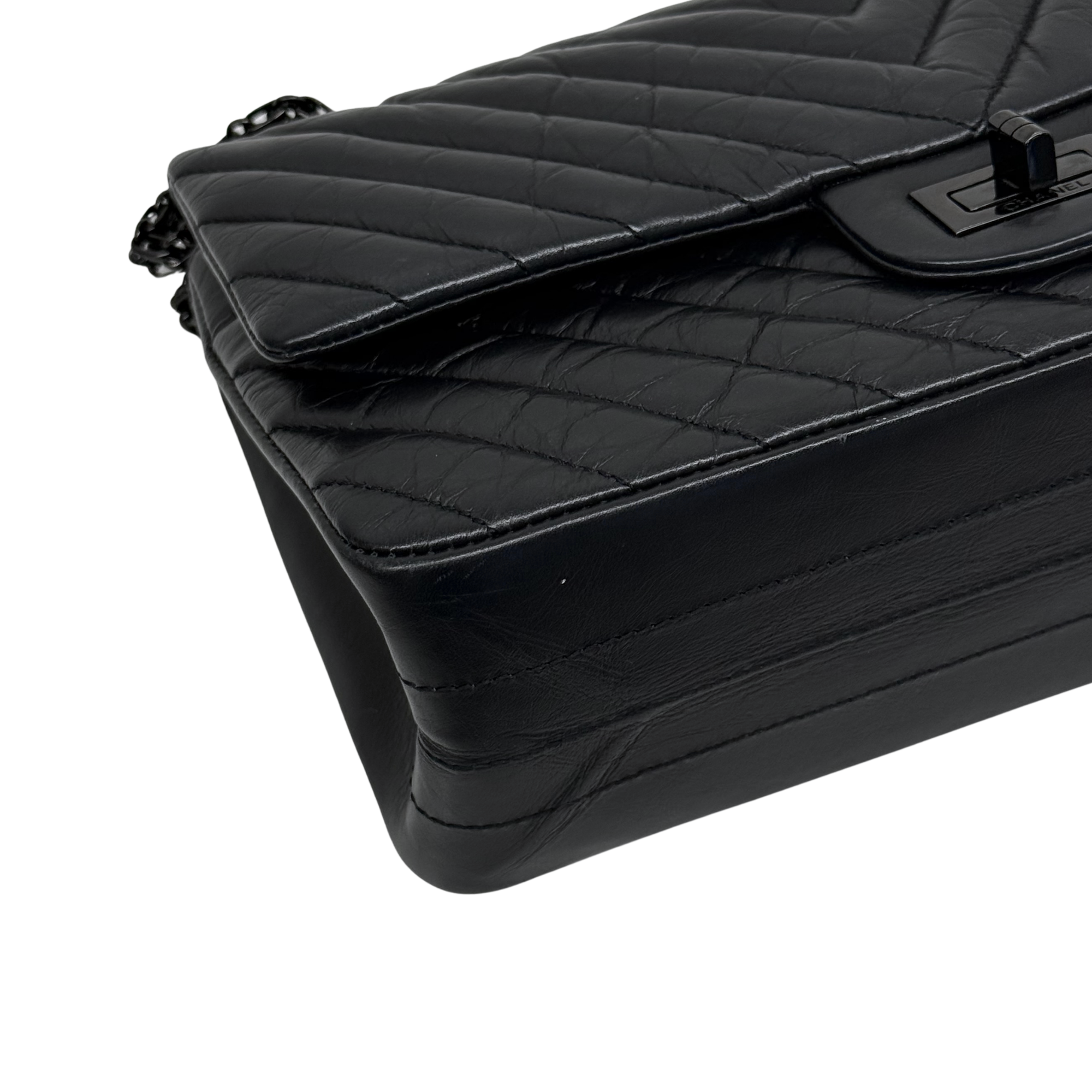 Chanel black bag black hardware triangle