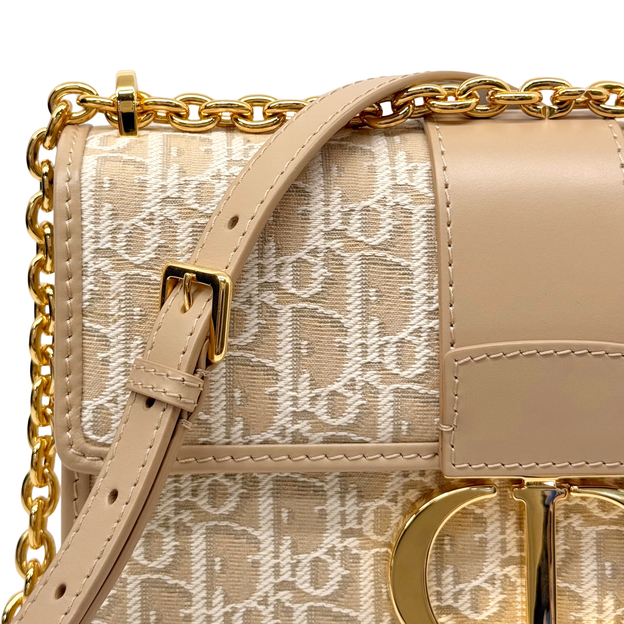 Dior pre-owned crossbody bag with beige monogram canvas, gold buckle, and chain strap