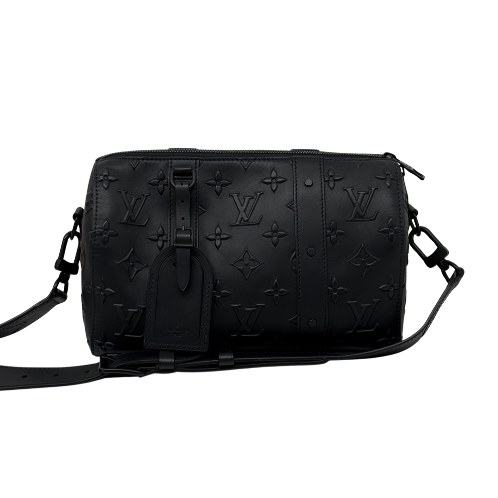 Black Louis Vuitton monogram crossbody bag with strap and front zipper opening, side view