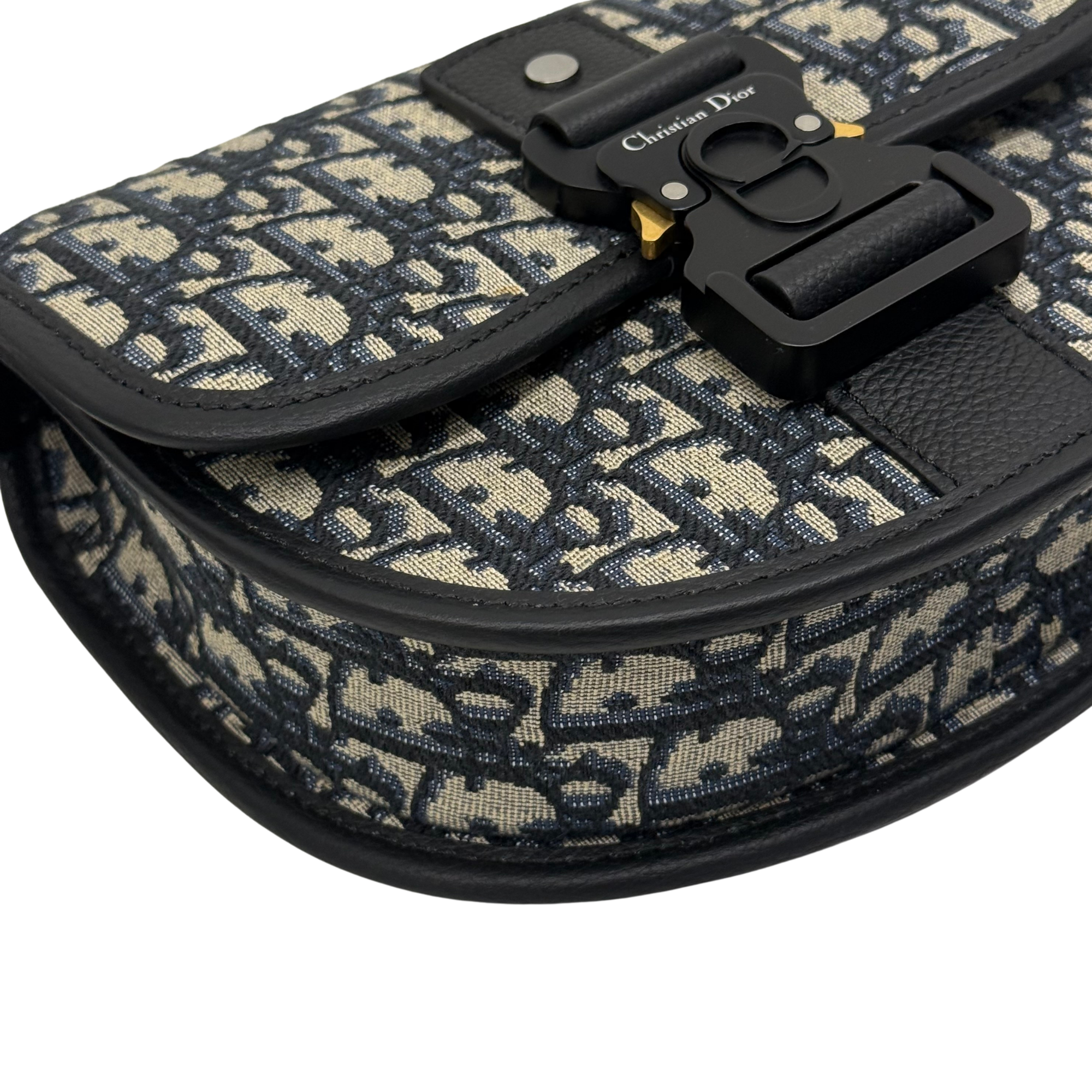 Dior patterned flap corner with black leather trim and front clasp