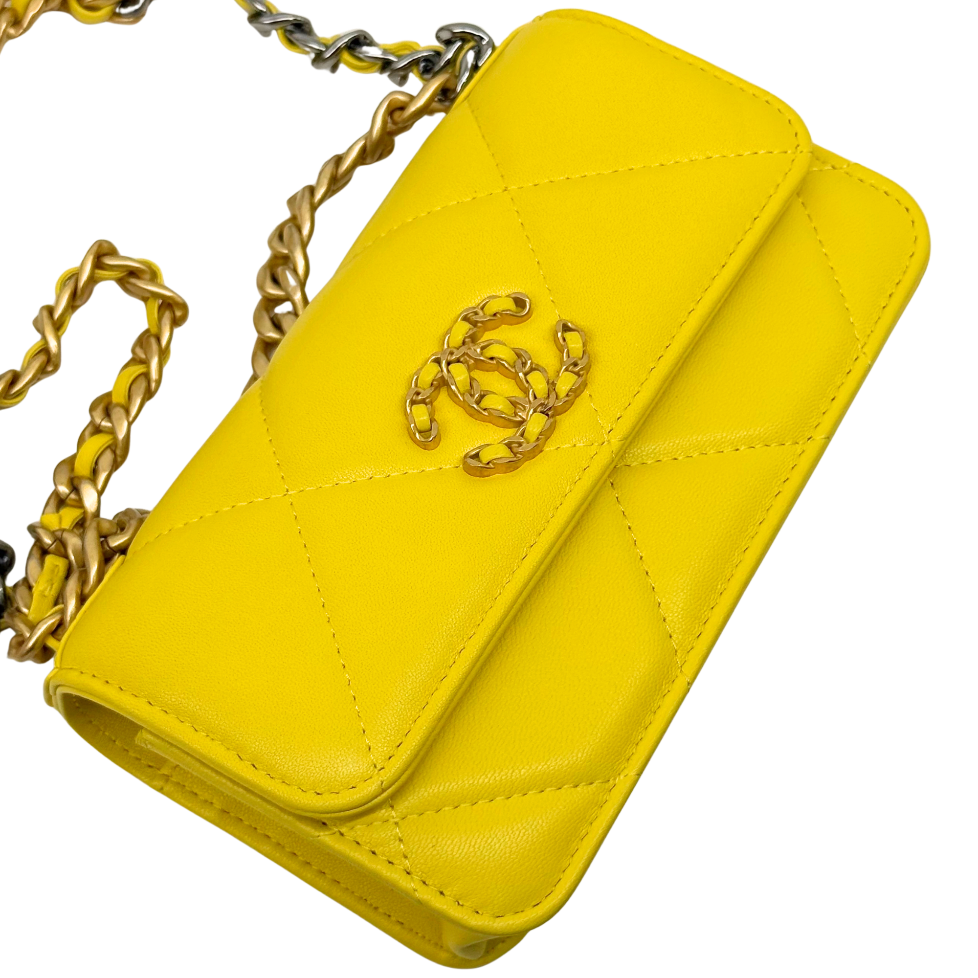 Yellow quilted mini crossbody bag with gold chain and front logo plate