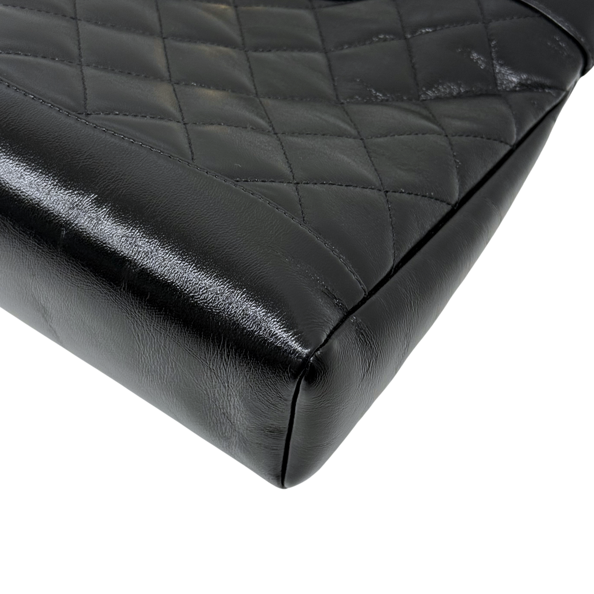 Chanel black bag leather handle