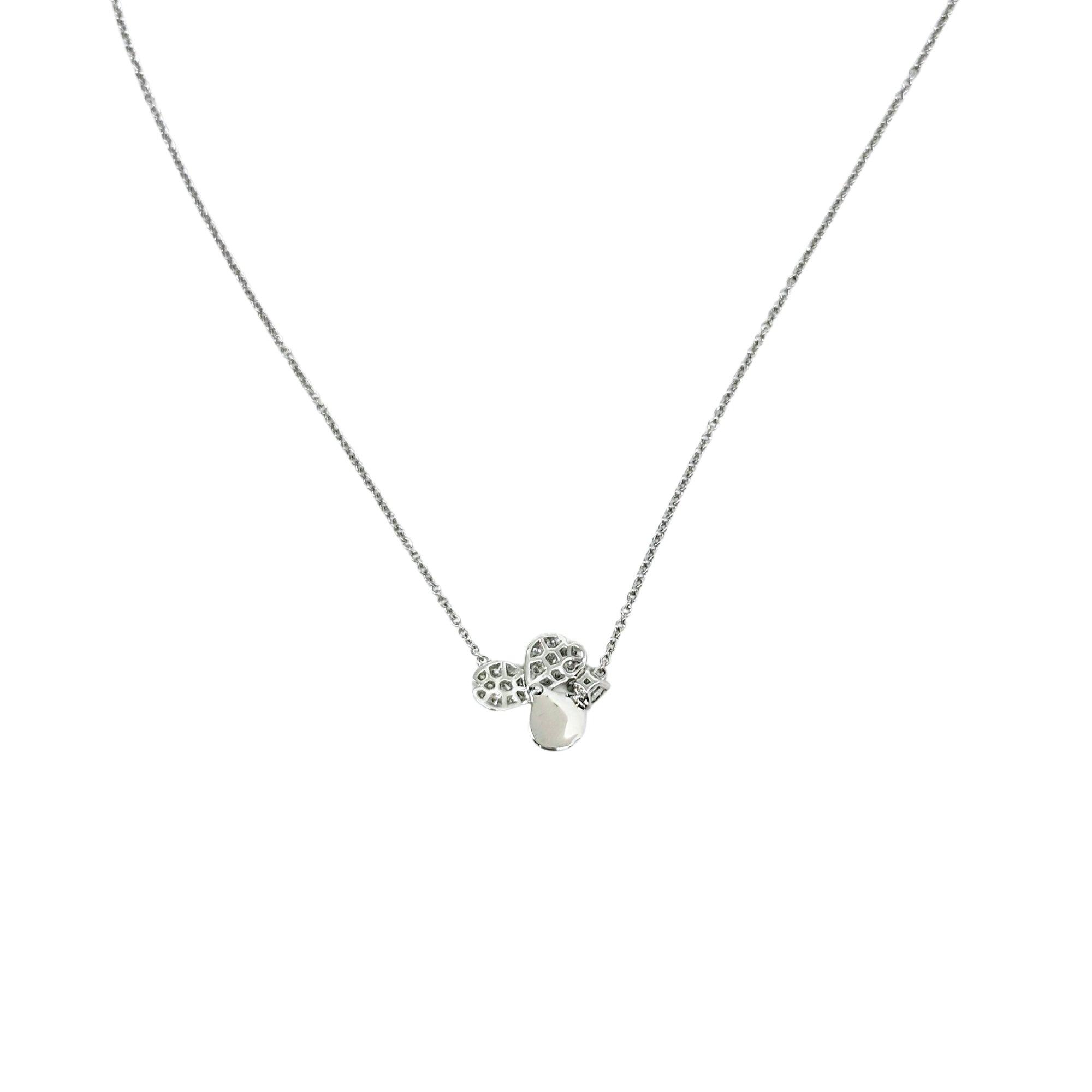Tiffany & Co. four-leaf clover pendant necklace with silver-tone chain and small round stones