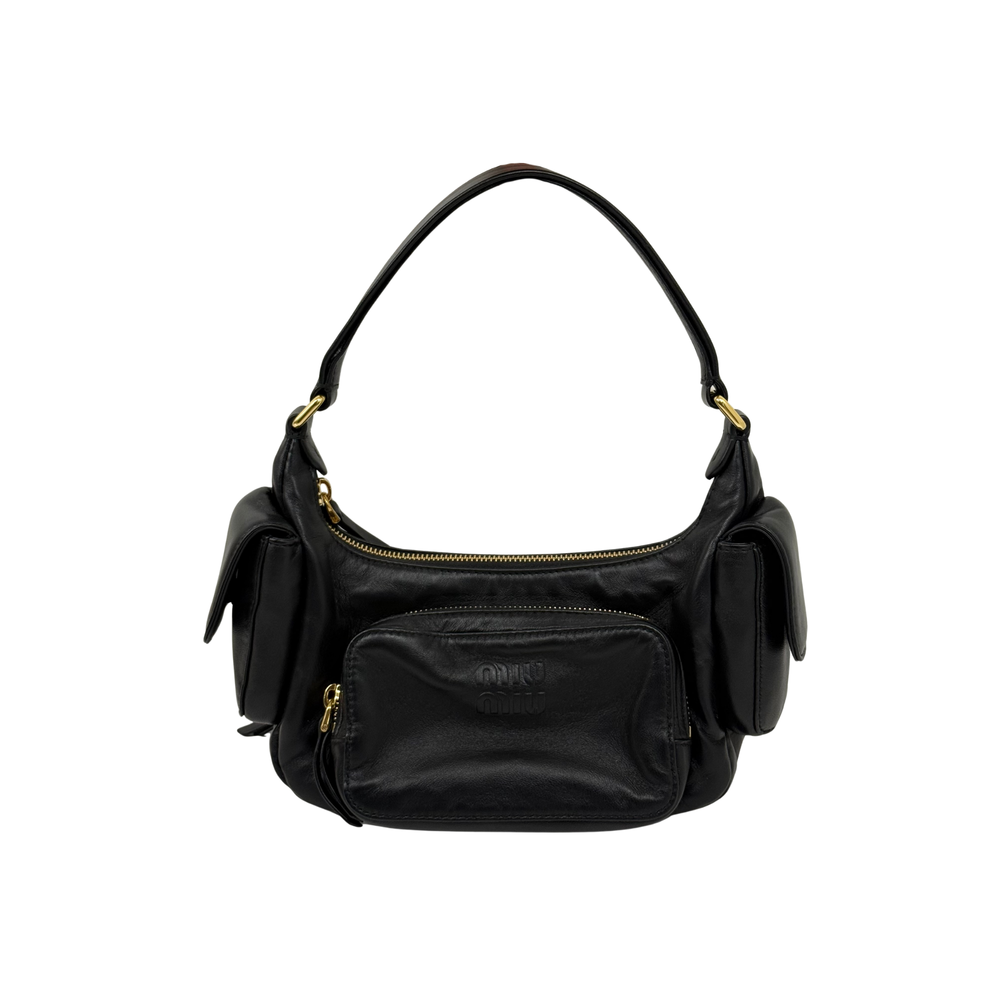 Black leather shoulder bag with gold zipper closure, front pocket, and top handles