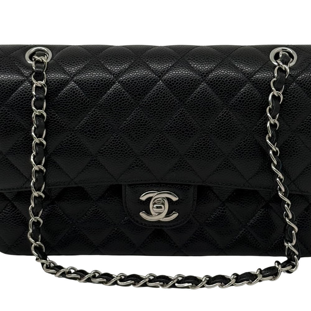 Chanel quilted flap front with logo medallion and two silver-tone chain attachments