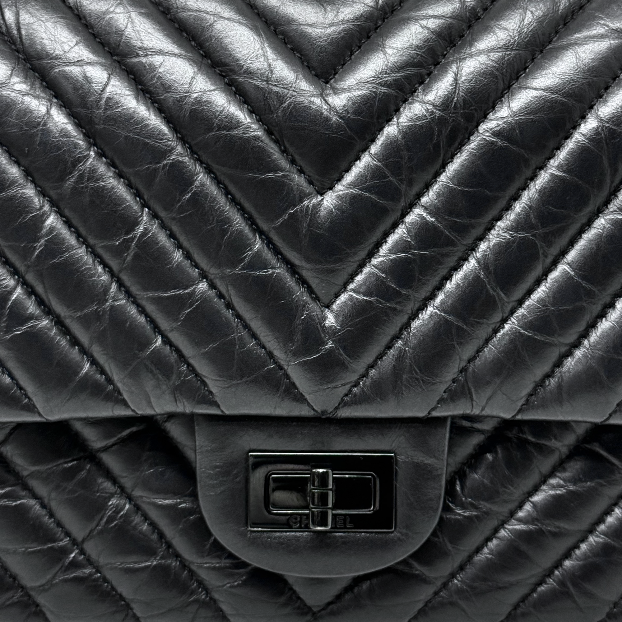 Chanel black bag black hardware triangle