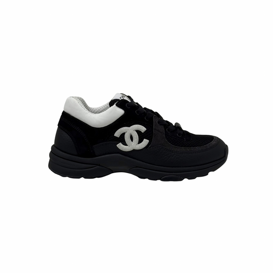 Chanel black leather lace-up sneaker with white CC logo and rubber sole