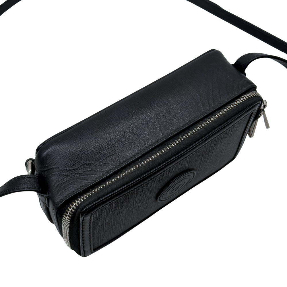 Small crossbody bag with zip closure, black textured leather, carry strap